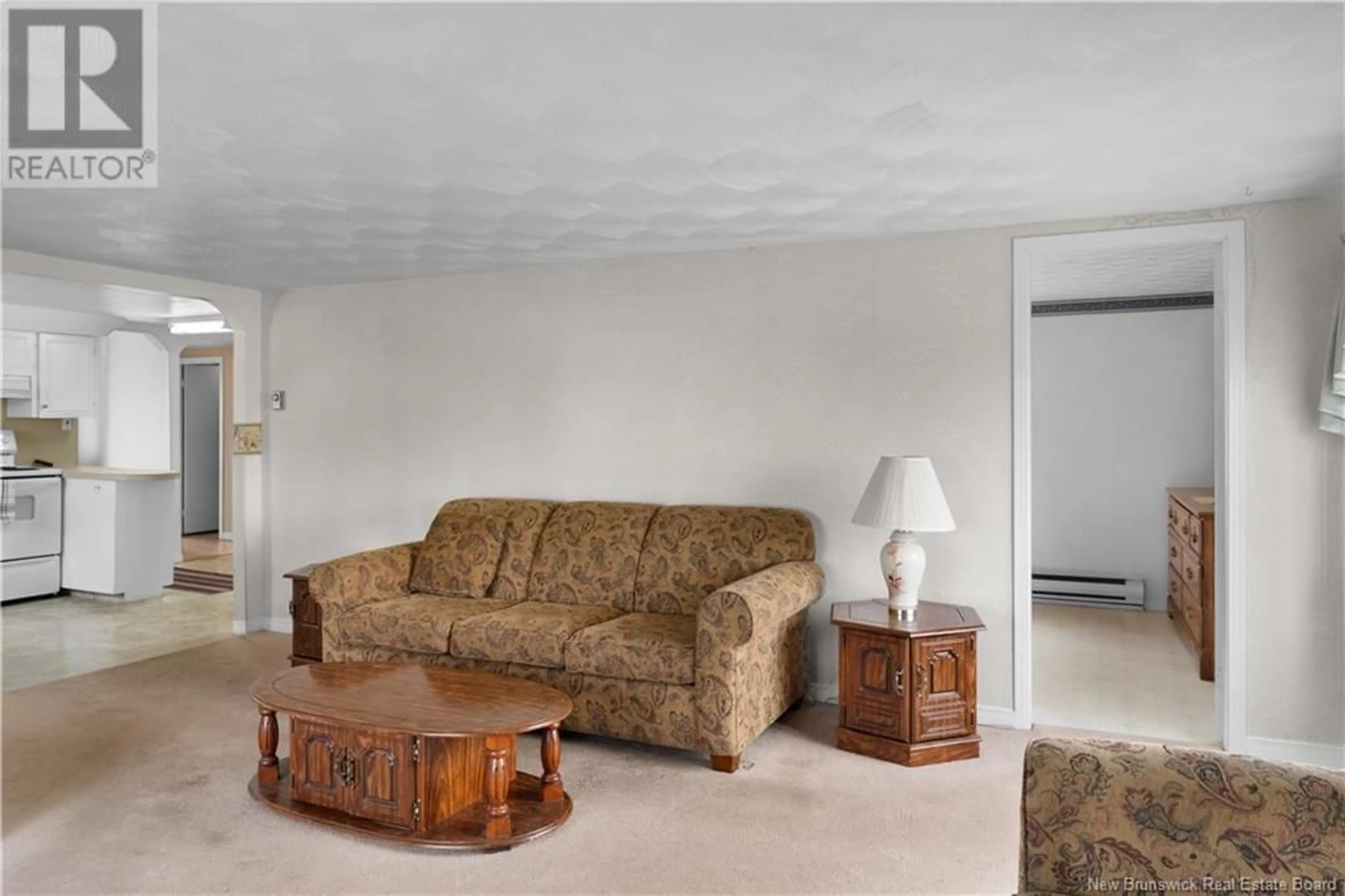 Living room with furniture, carpet floor for 91 CAP-LUMIERE ROAD, Richibouctou-Village New Brunswick E4W1C8