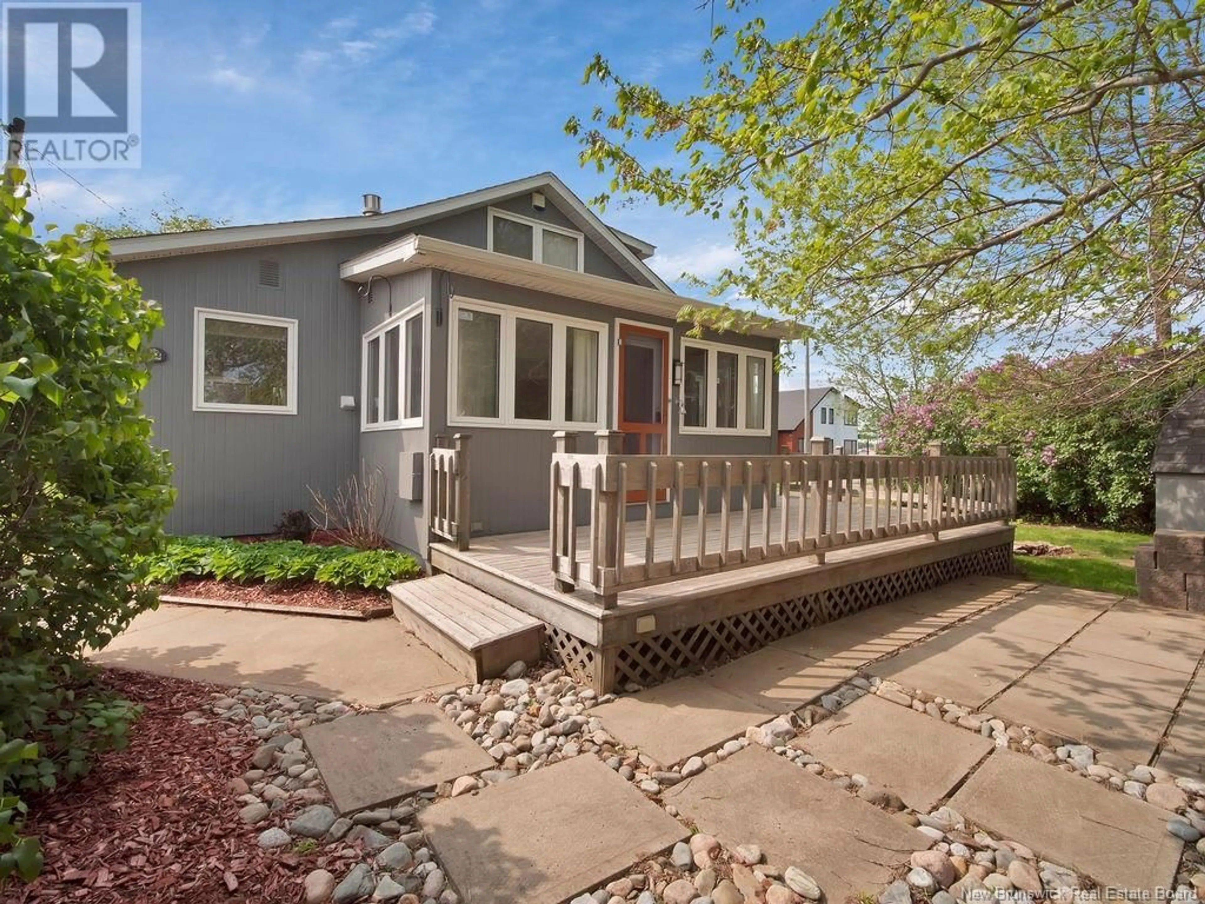 Home with vinyl exterior material, street for 62 WESTSHORE DRIVE, Shediac New Brunswick E4P5J9
