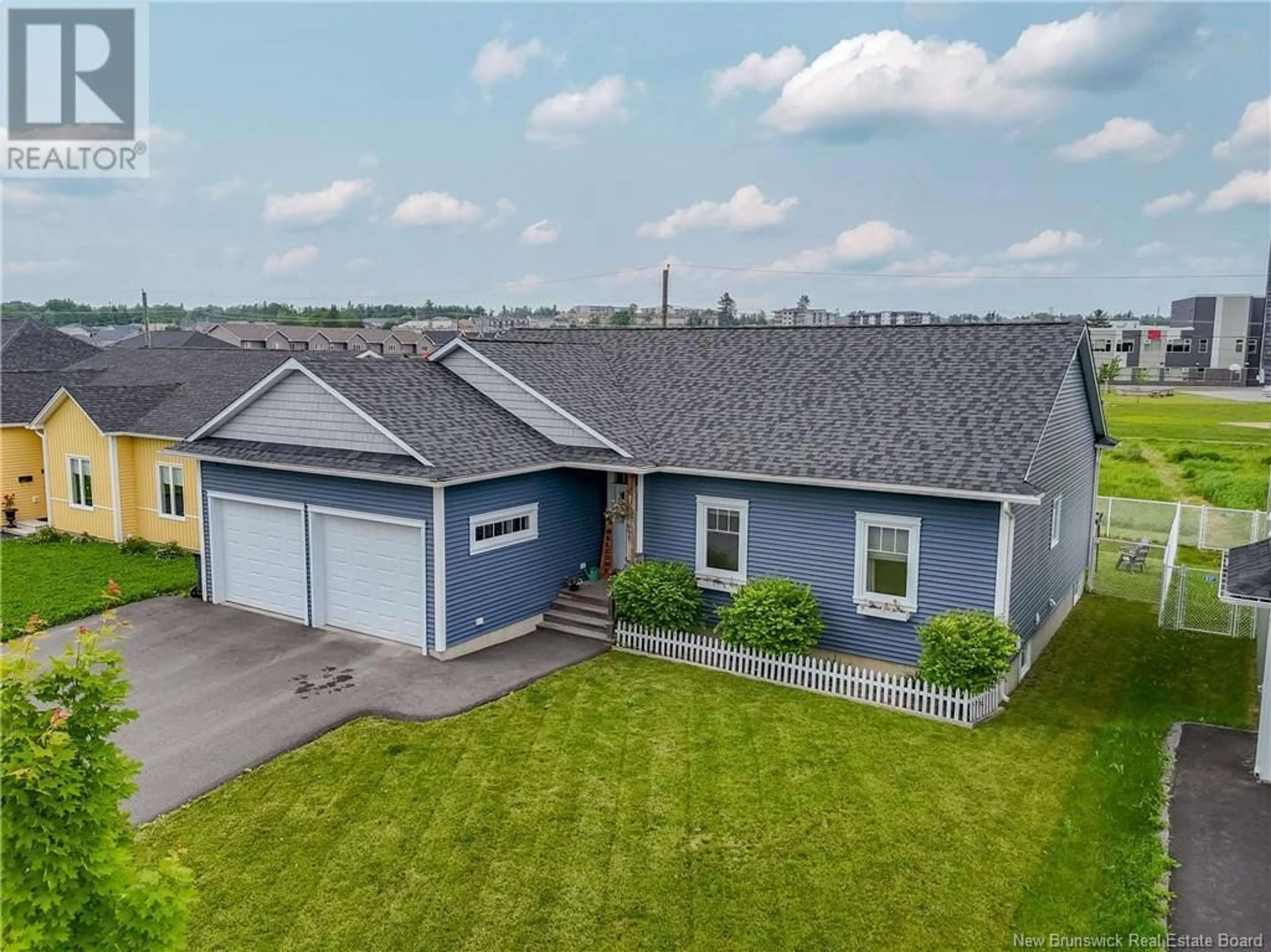 A pic from outside/outdoor area/front of a property/back of a property/a pic from drone, street for 699 MCEVOY STREET, Fredericton New Brunswick E3A3B8