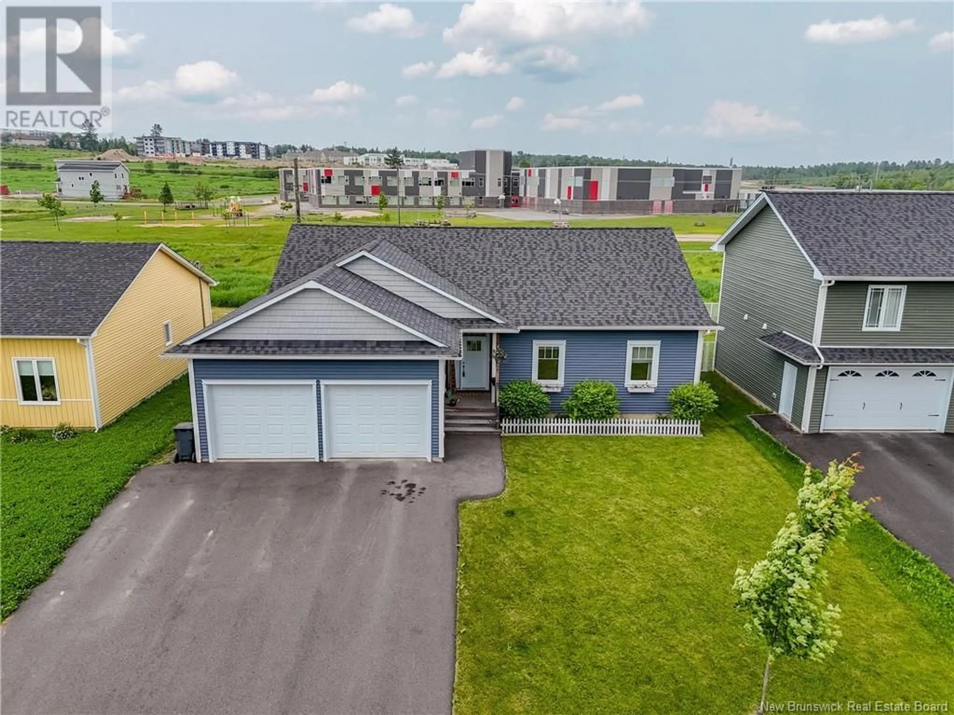A pic from outside/outdoor area/front of a property/back of a property/a pic from drone, street for 699 MCEVOY STREET, Fredericton New Brunswick E3A3B8