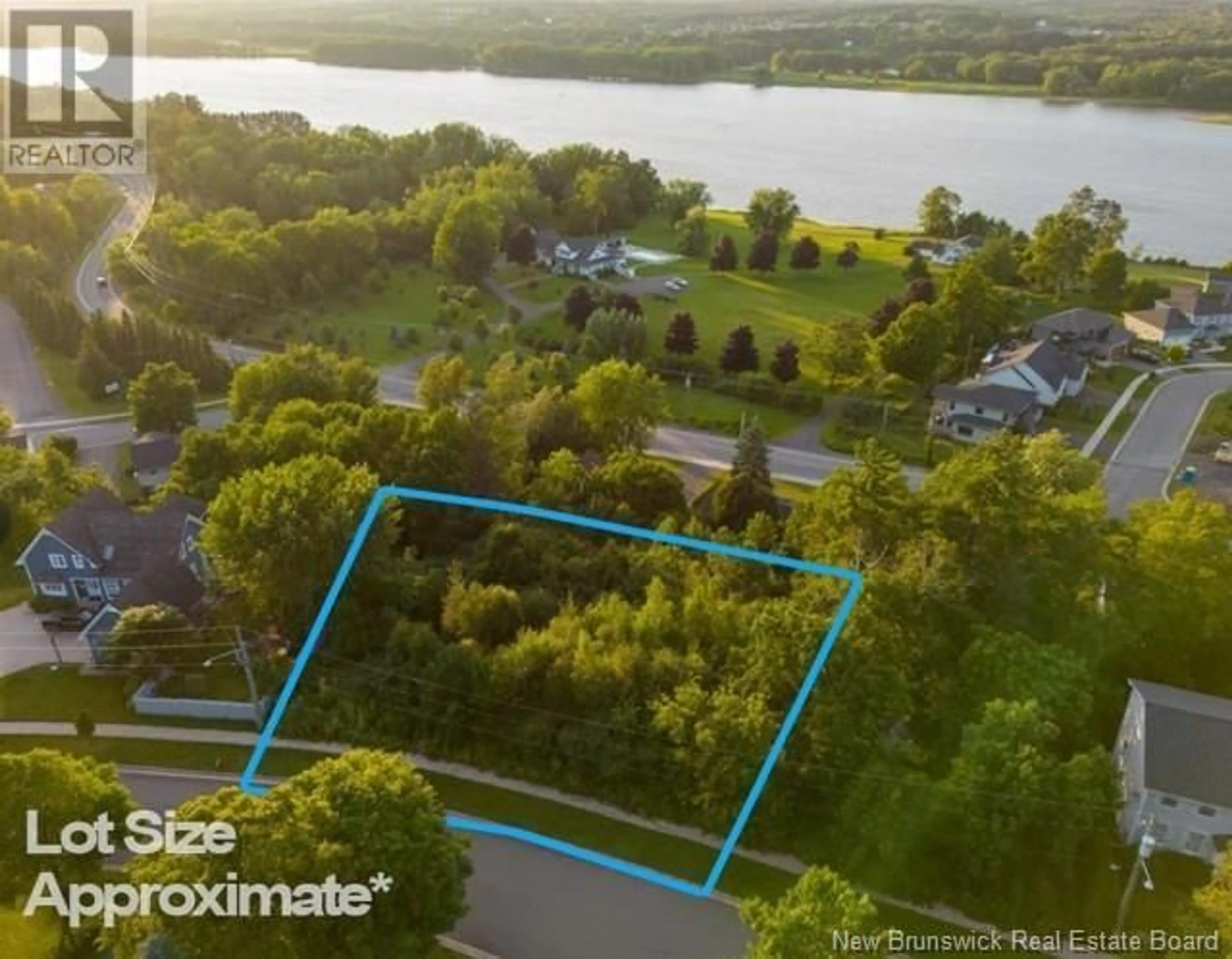 A pic from outside/outdoor area/front of a property/back of a property/a pic from drone, water/lake/river/ocean view for 53 KINGSWOOD DRIVE, Fredericton New Brunswick E3B6Z8