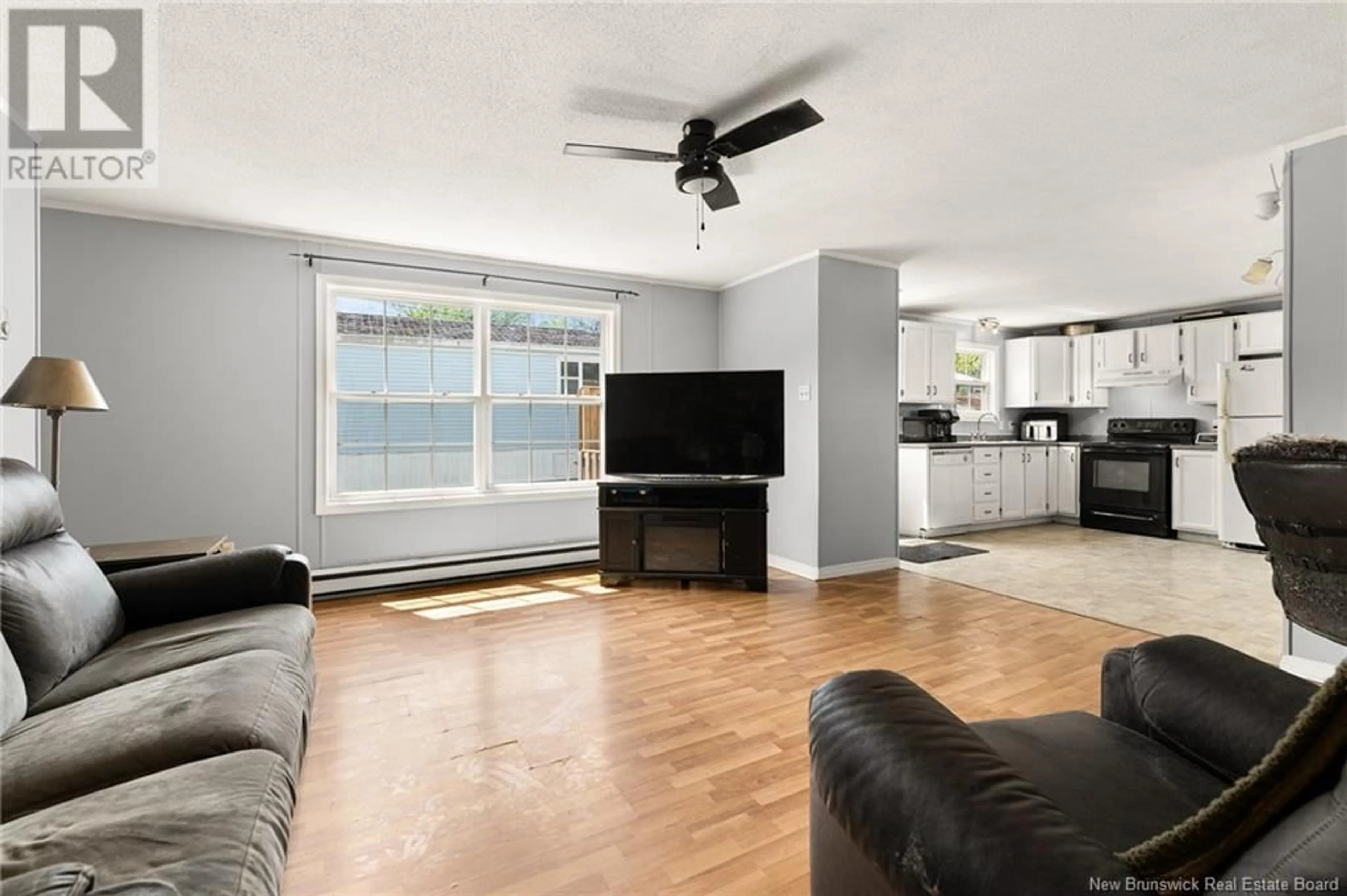 Living room with furniture, unknown for 16 CASCADE AVENUE, Moncton New Brunswick E1E2J7