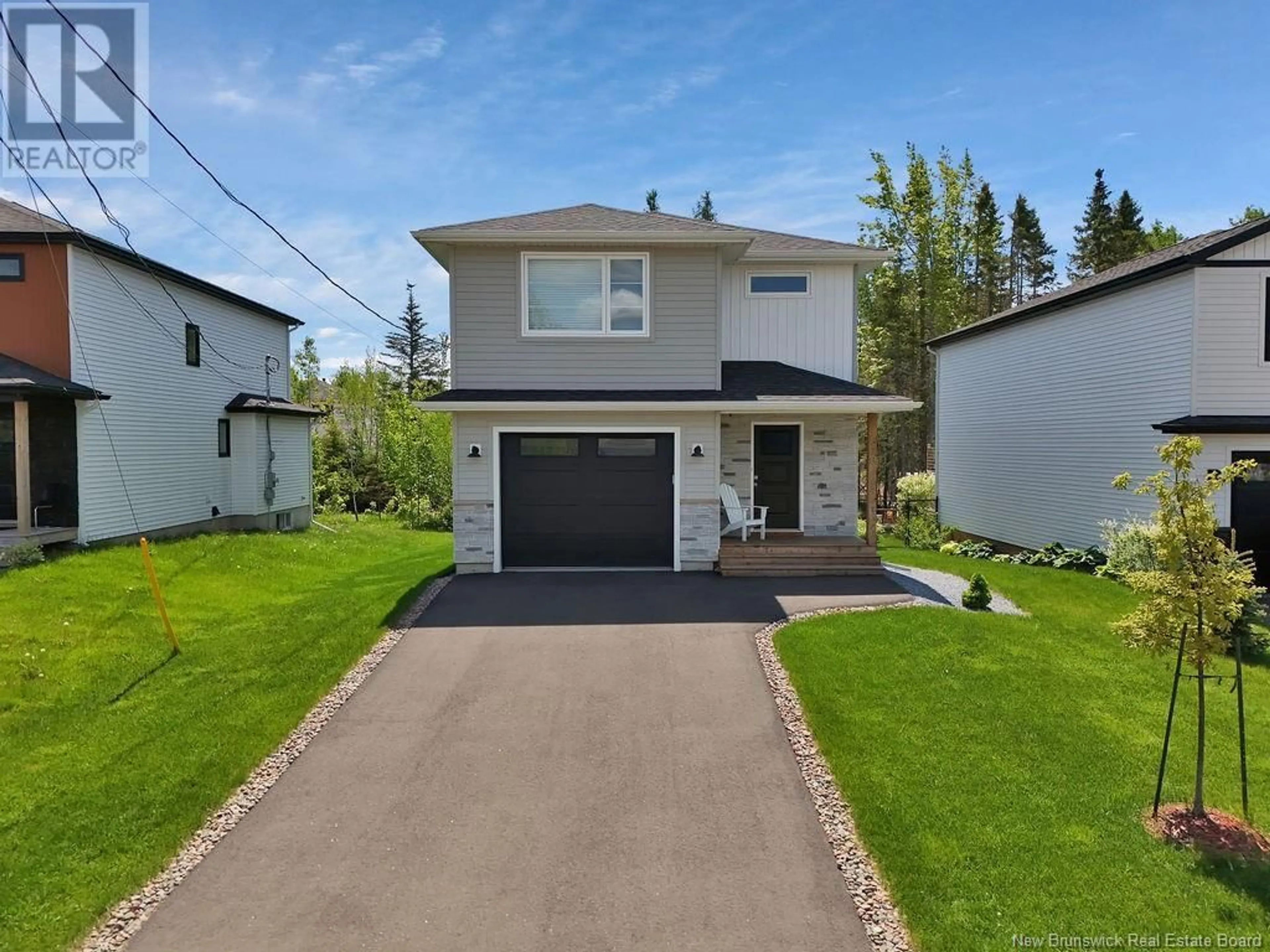 Home with vinyl exterior material, street for 518 MAPLEHURST, Moncton New Brunswick E1G6E2