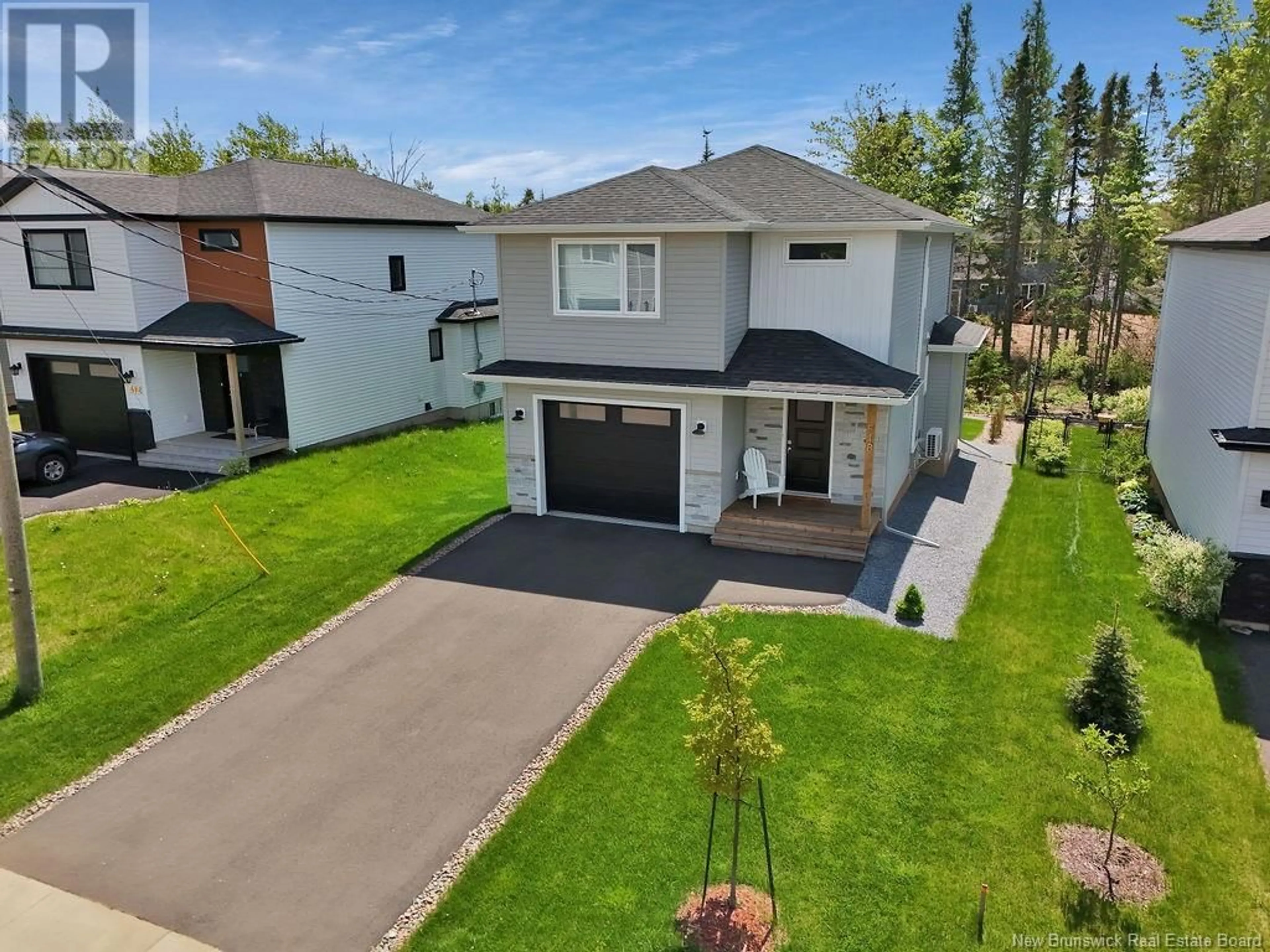 A pic from outside/outdoor area/front of a property/back of a property/a pic from drone, street for 518 MAPLEHURST, Moncton New Brunswick E1G6E2