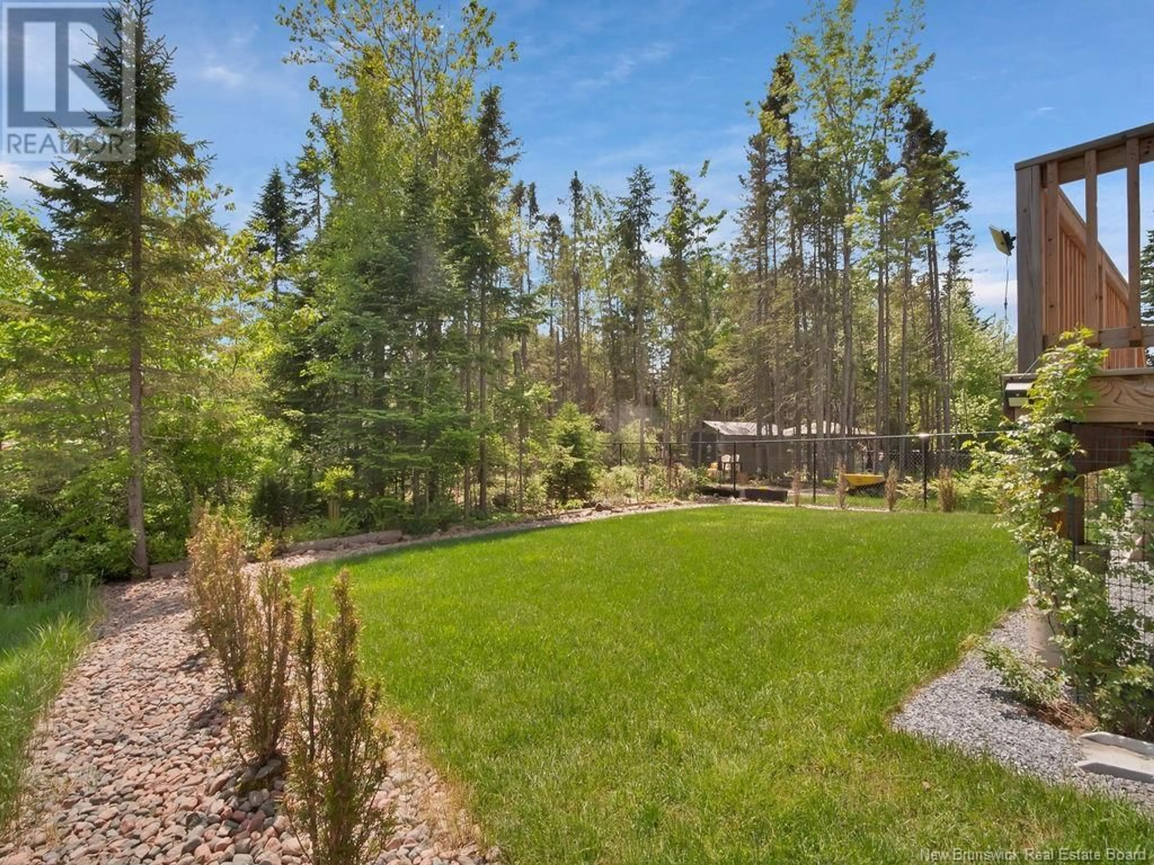 A pic from outside/outdoor area/front of a property/back of a property/a pic from drone, forest/trees view for 518 MAPLEHURST, Moncton New Brunswick E1G6E2