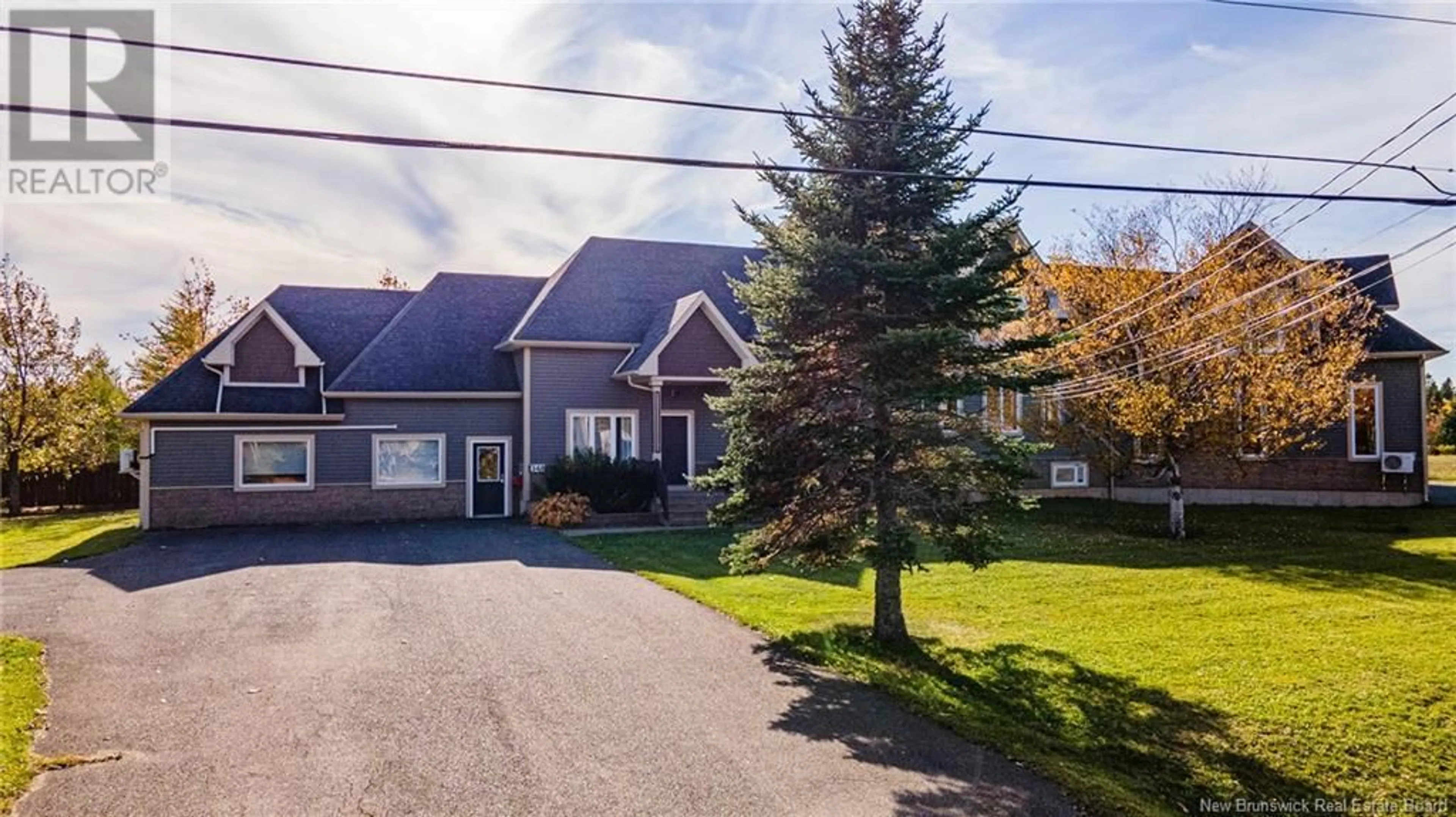 A pic from outside/outdoor area/front of a property/back of a property/a pic from drone, street for 348 DIGNARD STREET, Tracadie New Brunswick E1X1A2