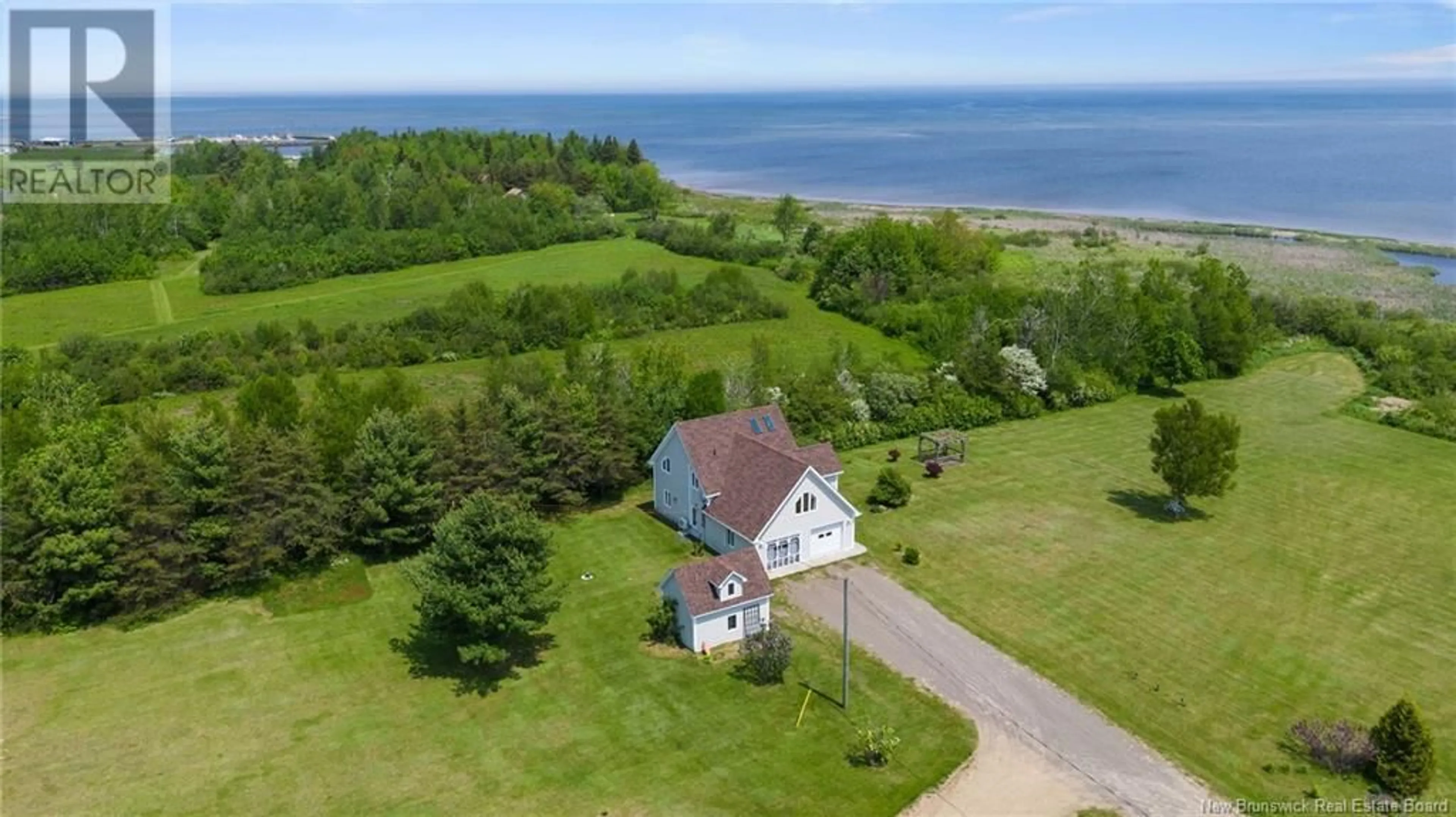 A pic from outside/outdoor area/front of a property/back of a property/a pic from drone, water/lake/river/ocean view for 3202 ROUTE 535, Cocagne New Brunswick E4R3K3