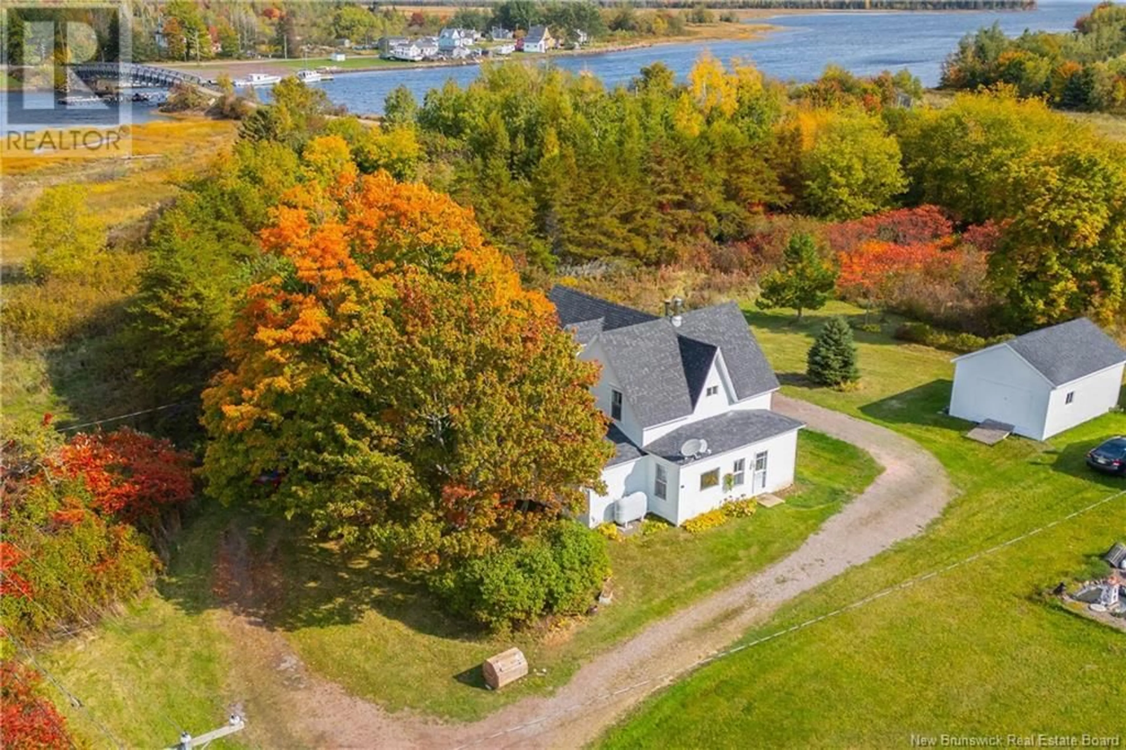 A pic from outside/outdoor area/front of a property/back of a property/a pic from drone, water/lake/river/ocean view for 13 MILL STREET, Port Elgin New Brunswick E4M2E5