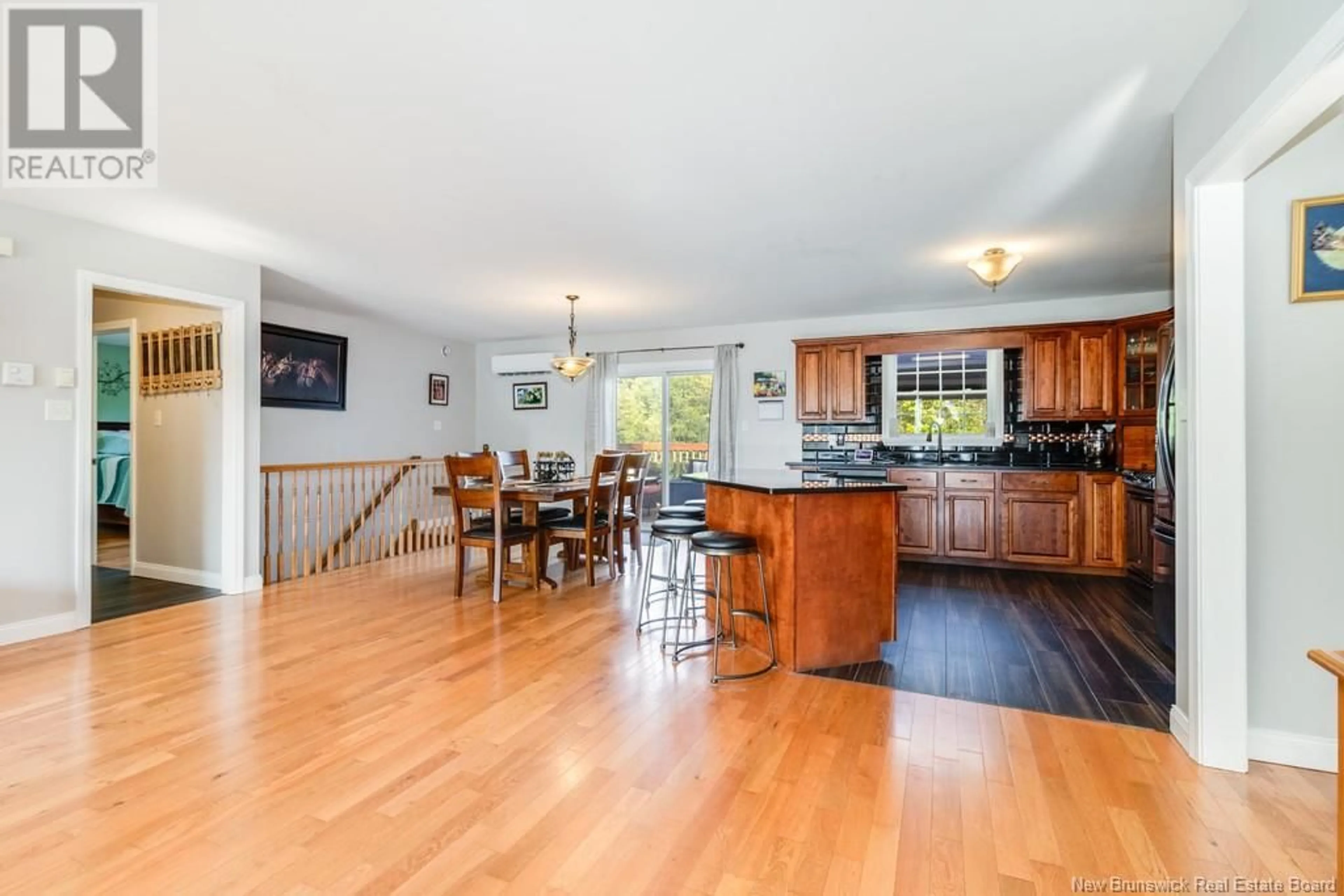Open concept kitchen, wood/laminate floor for 12 DAWSON DRIVE, Oromocto New Brunswick E2V4S7