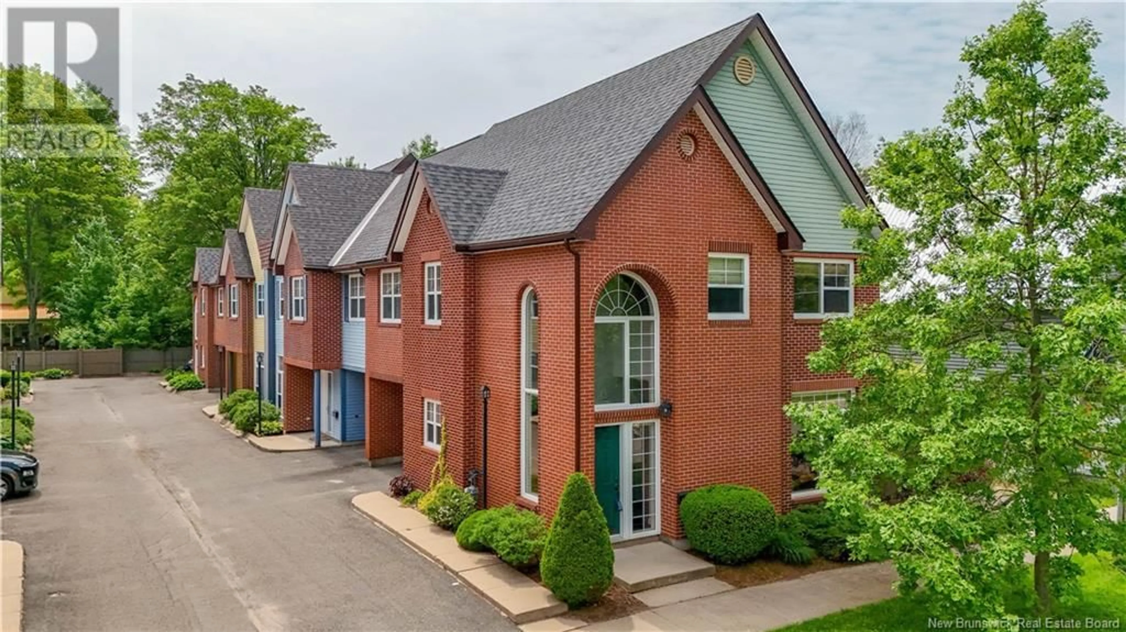 A pic from outside/outdoor area/front of a property/back of a property/a pic from drone, street for 2 ANDAL LANE, Fredericton New Brunswick E3B1P9
