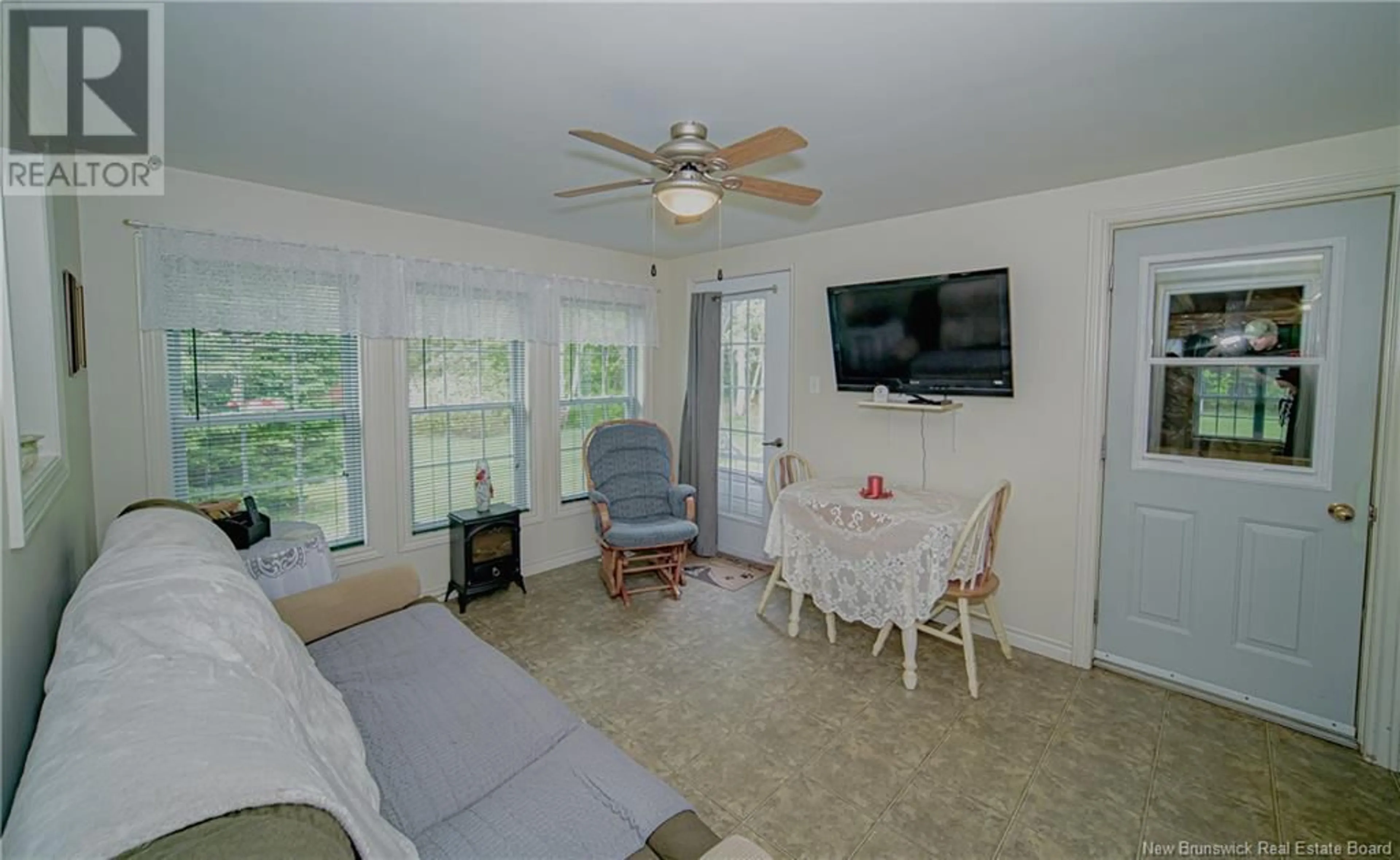 Living room with furniture, ceramic/tile floor for 562 CARROLLS CROSSING ROAD, Carrolls Crossing New Brunswick E9C2G4