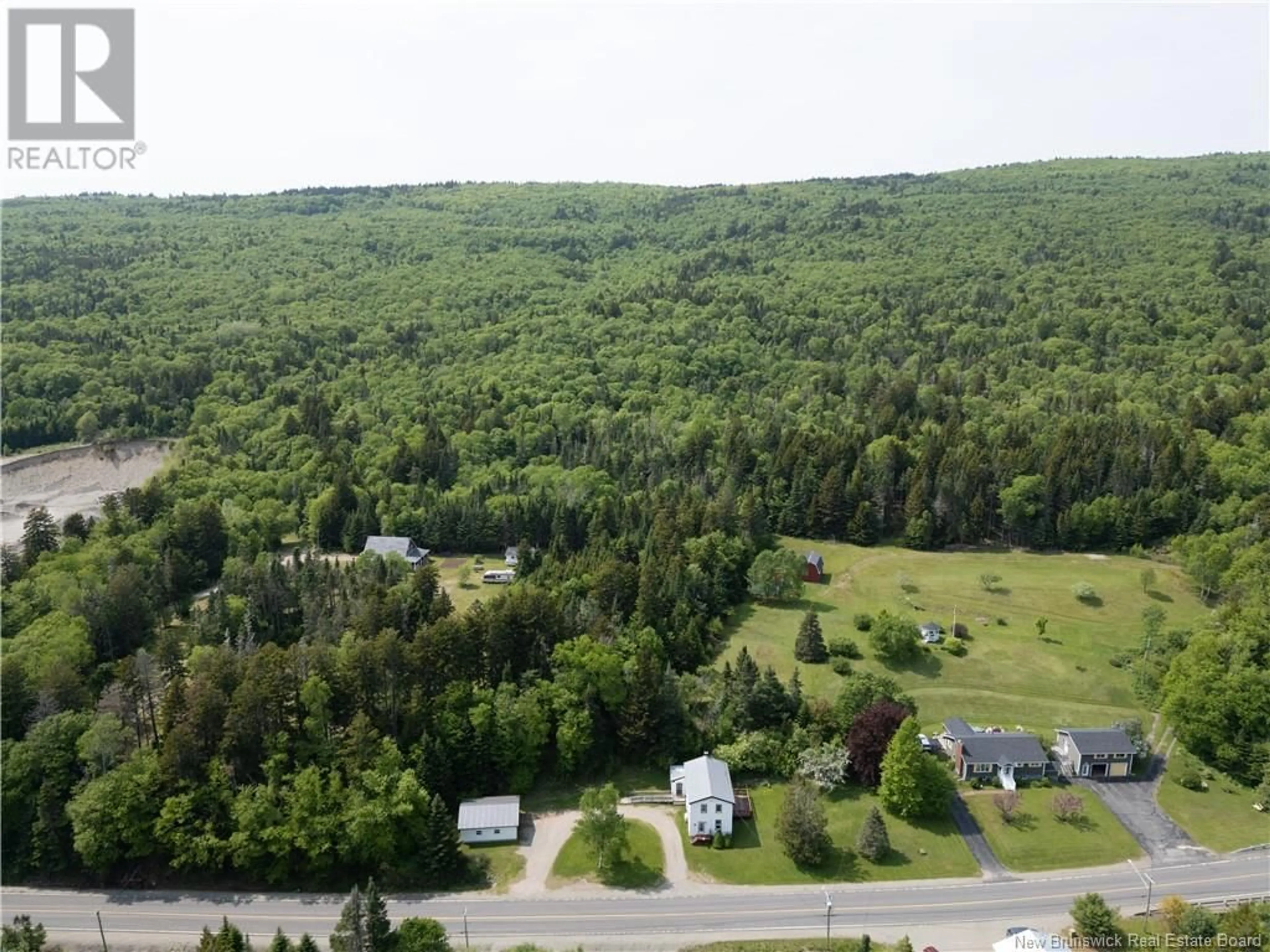 A pic from outside/outdoor area/front of a property/back of a property/a pic from drone, forest/trees view for 8390 MAIN STREET, Alma New Brunswick E4H1M3