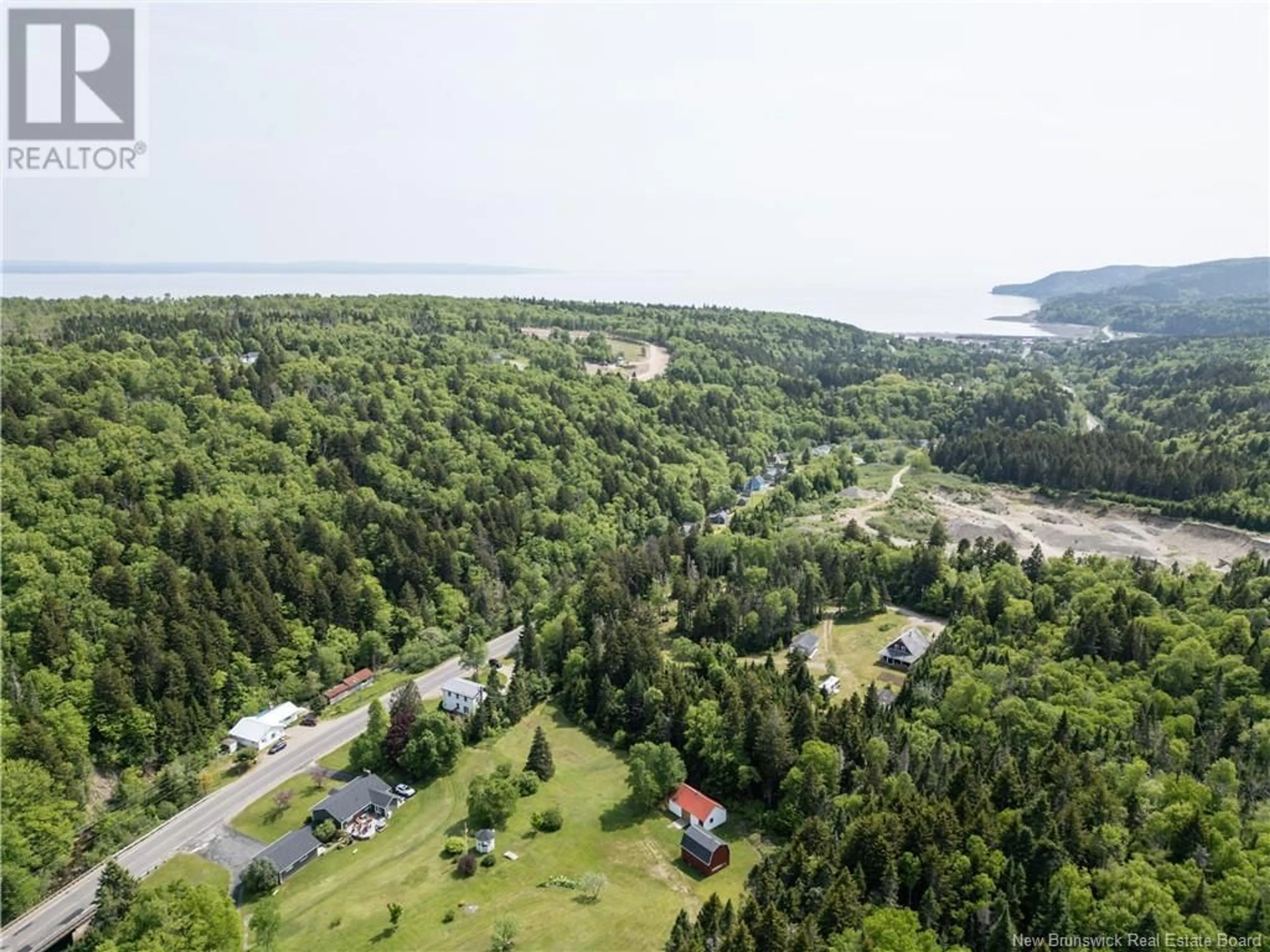 A pic from outside/outdoor area/front of a property/back of a property/a pic from drone, water/lake/river/ocean view for 8390 MAIN STREET, Alma New Brunswick E4H1M3