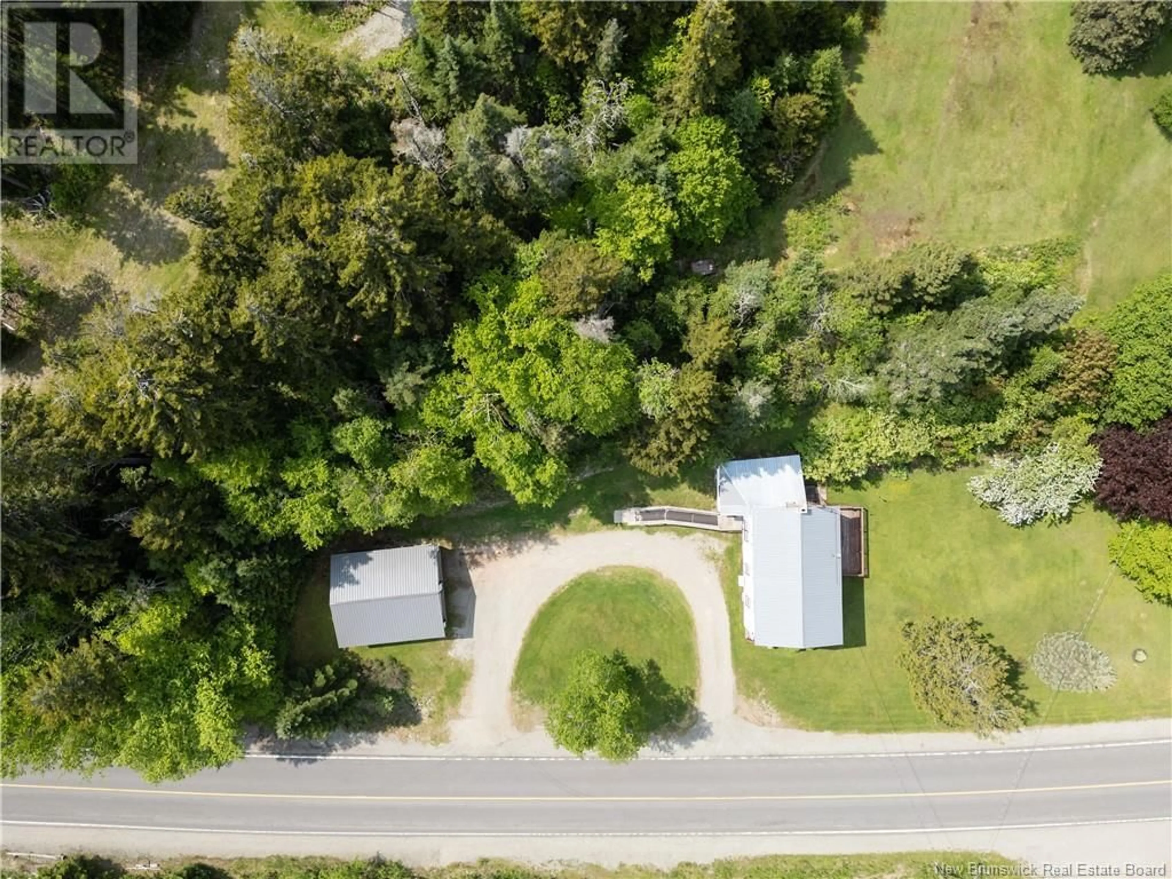 A pic from outside/outdoor area/front of a property/back of a property/a pic from drone, forest/trees view for 8390 MAIN STREET, Alma New Brunswick E4H1M3