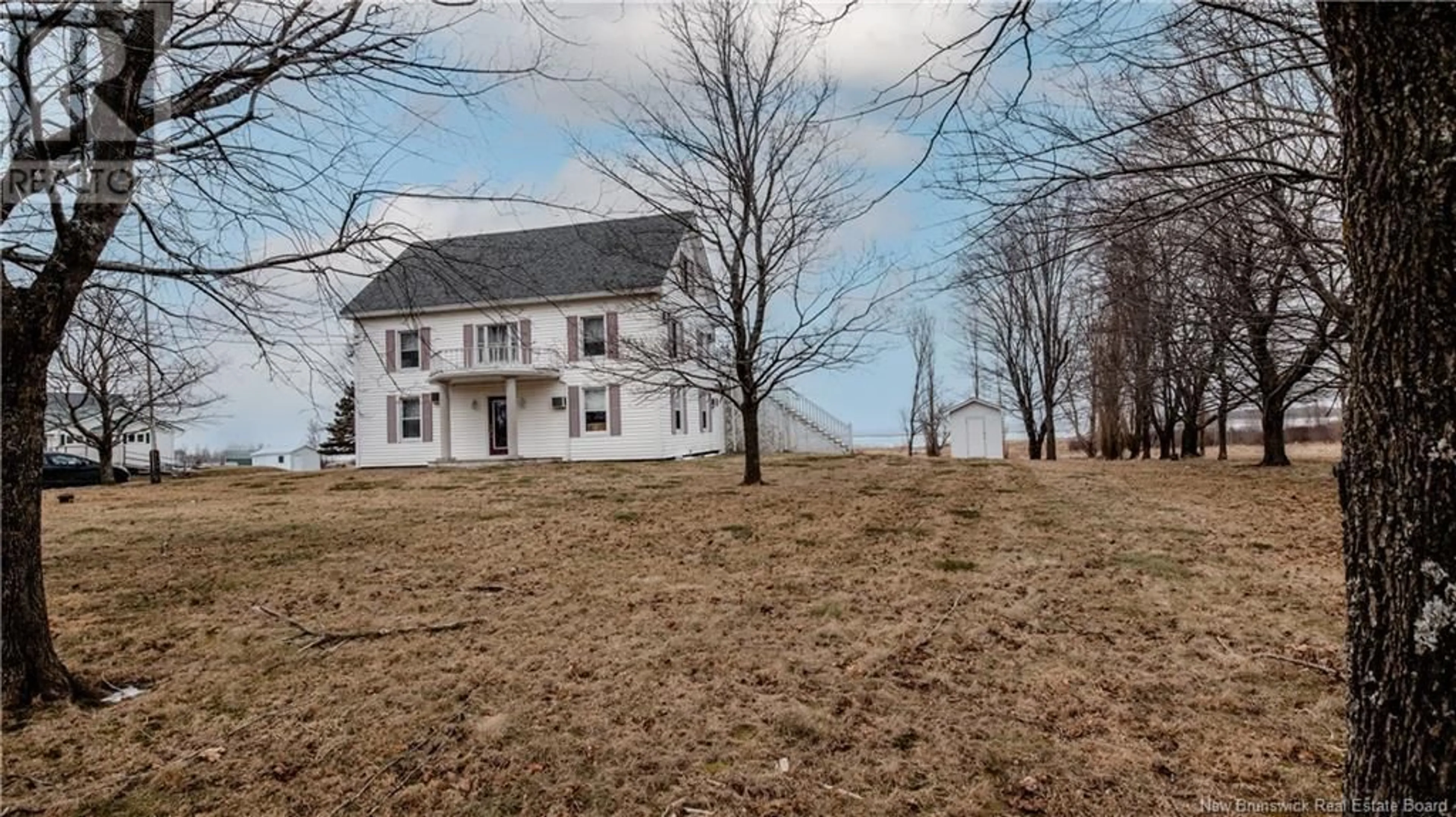 A pic from outside/outdoor area/front of a property/back of a property/a pic from drone, street for 1204 ROUTE 133, Grand-Barachois New Brunswick E4P8C5