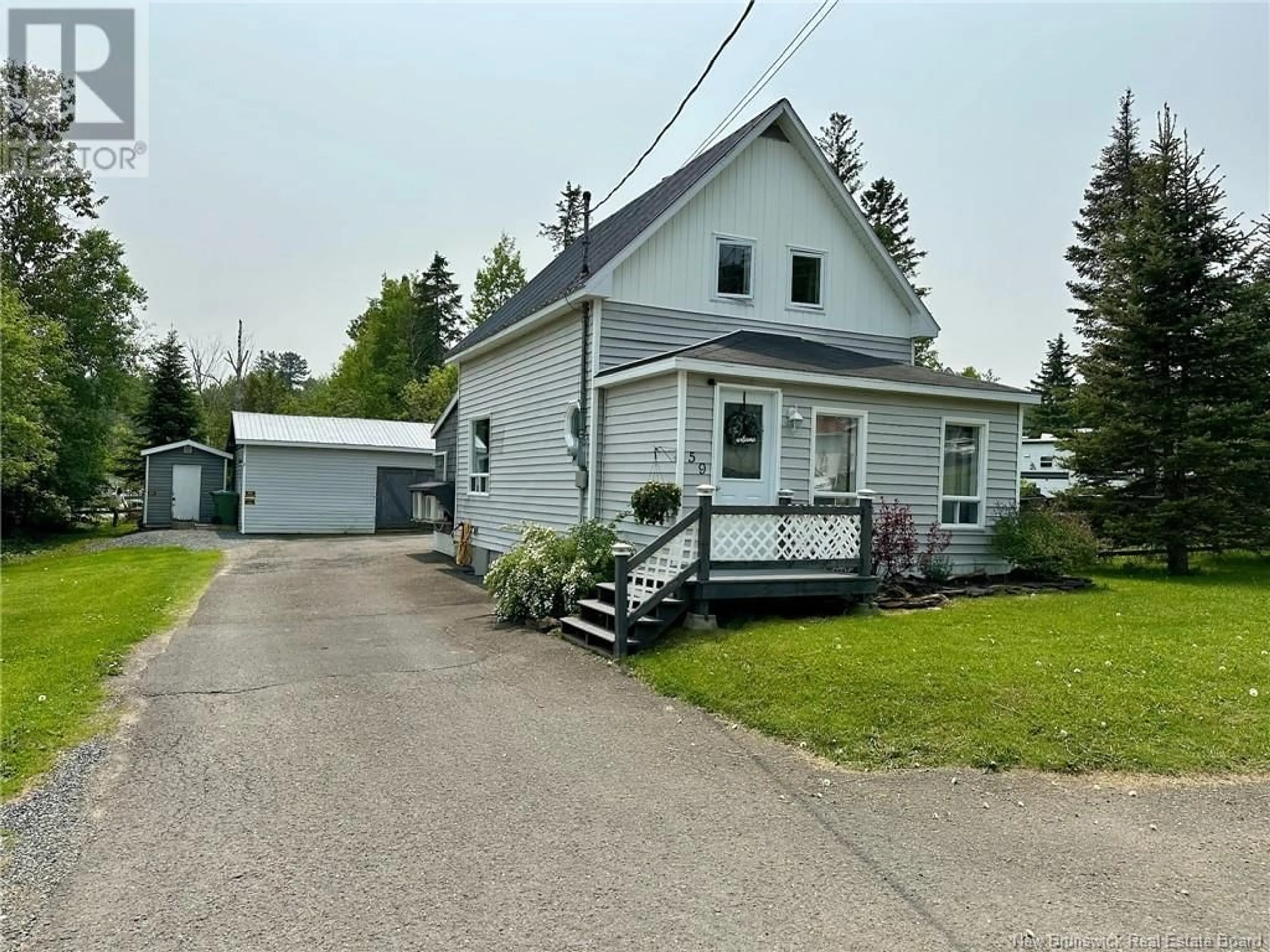 A pic from outside/outdoor area/front of a property/back of a property/a pic from drone, street for 59-61 POST STREET, Plaster Rock New Brunswick E7G2M7