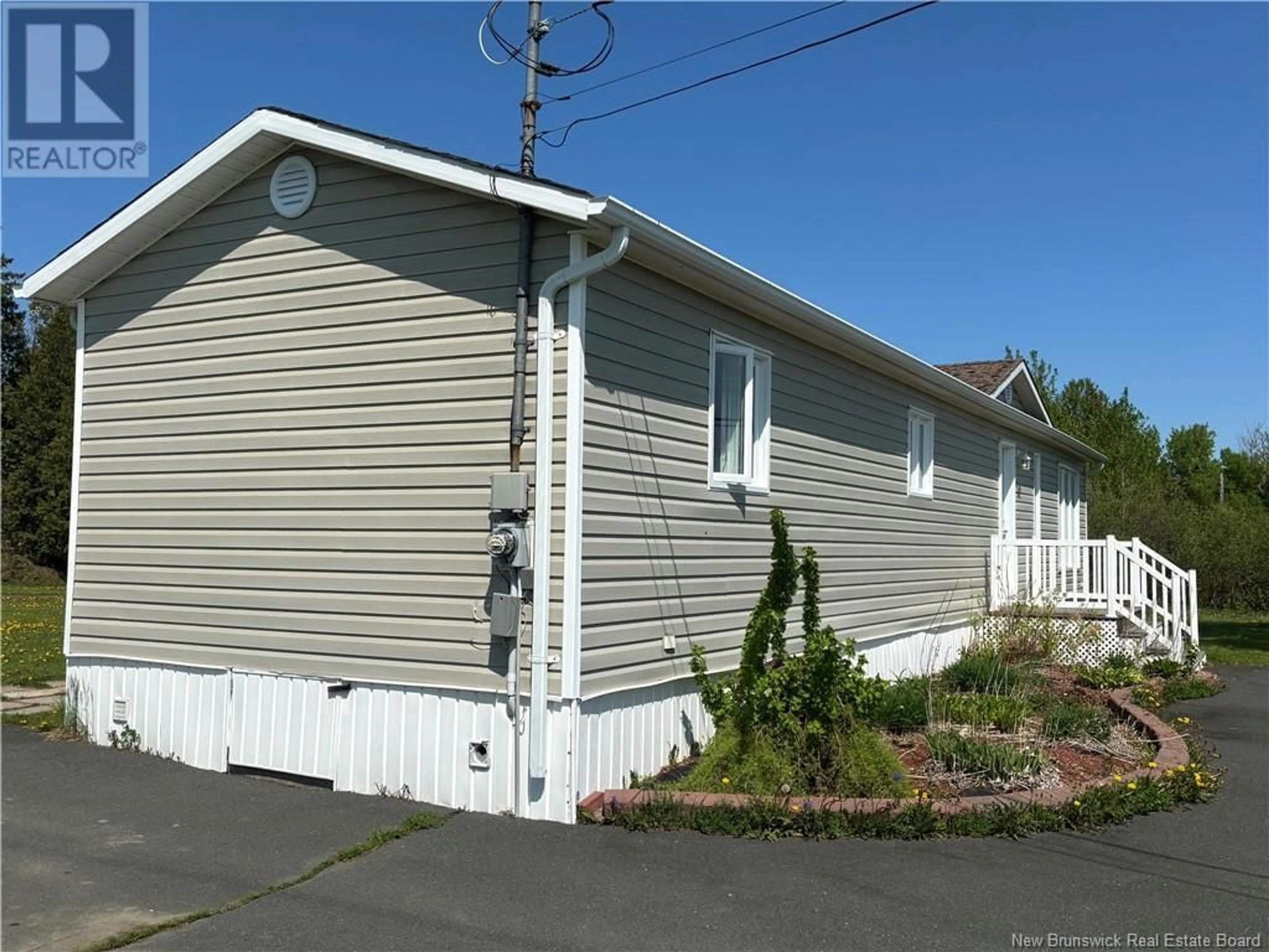 Home with vinyl exterior material, street for 48 ROUTE 134, Petit-Rocher-Nord New Brunswick E8J2H4