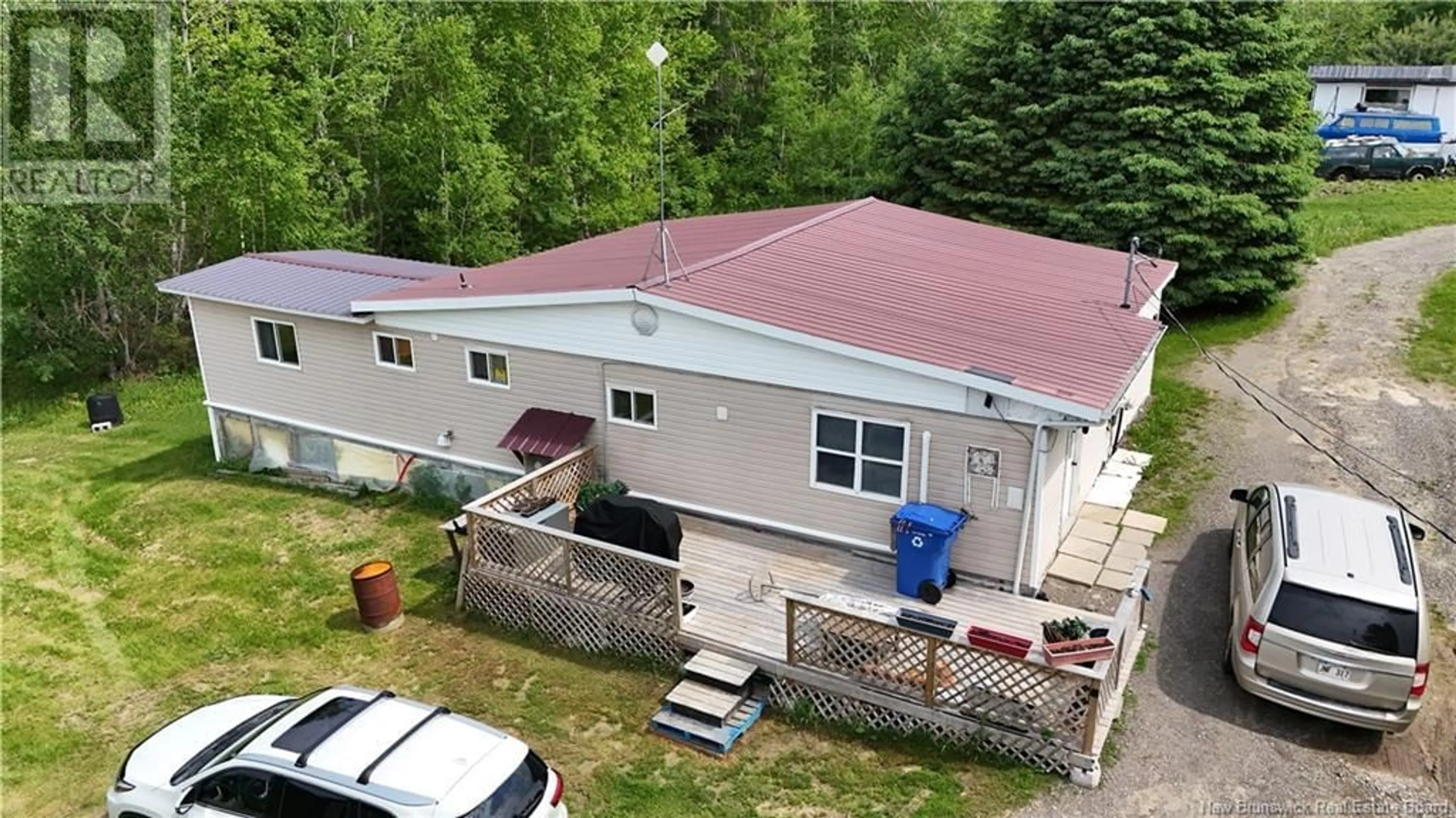 A pic from outside/outdoor area/front of a property/back of a property/a pic from drone, building for 5711 ROUTE 105, Pembroke New Brunswick E7N1T8