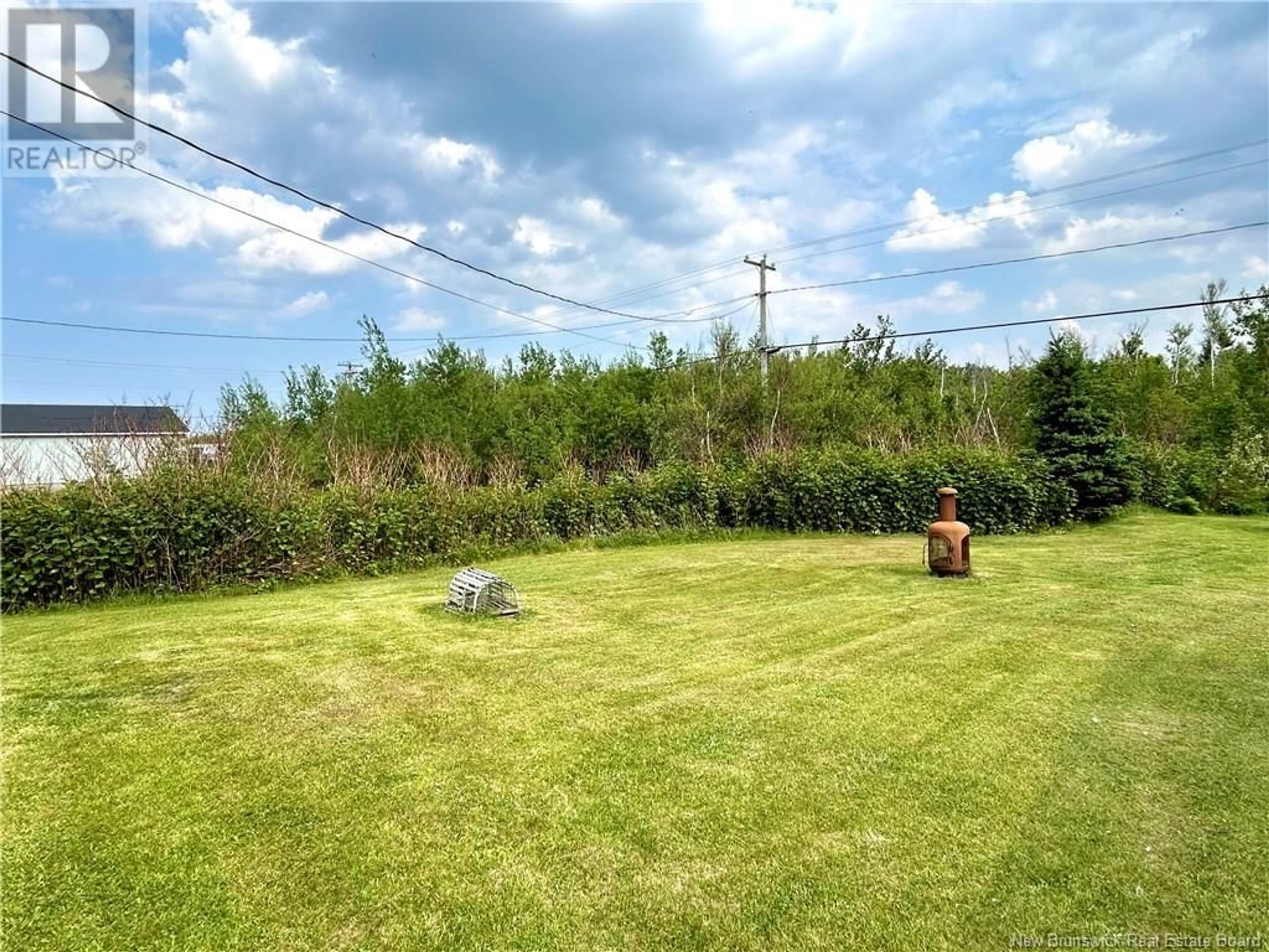 A pic from outside/outdoor area/front of a property/back of a property/a pic from drone, forest/trees view for 136 ESCUMINAC POINT ROAD, Escuminac New Brunswick E9A1V7
