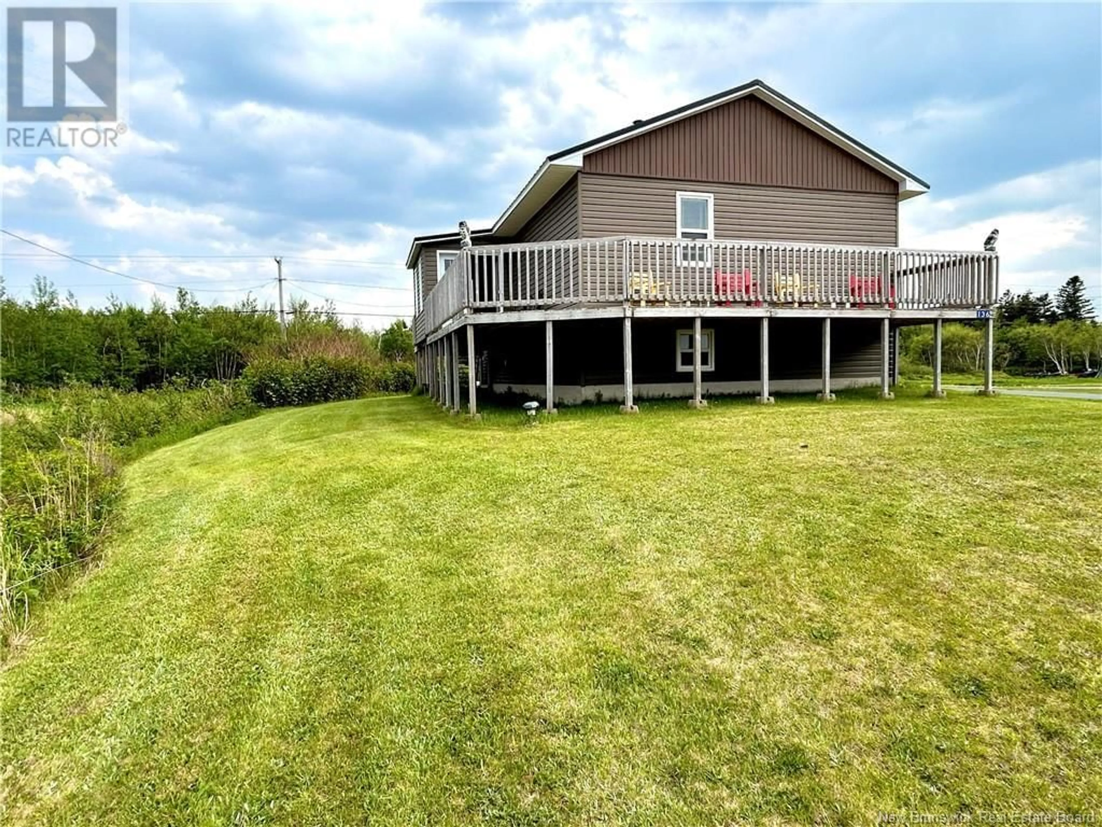 A pic from outside/outdoor area/front of a property/back of a property/a pic from drone, water/lake/river/ocean view for 136 ESCUMINAC POINT ROAD, Escuminac New Brunswick E9A1V7