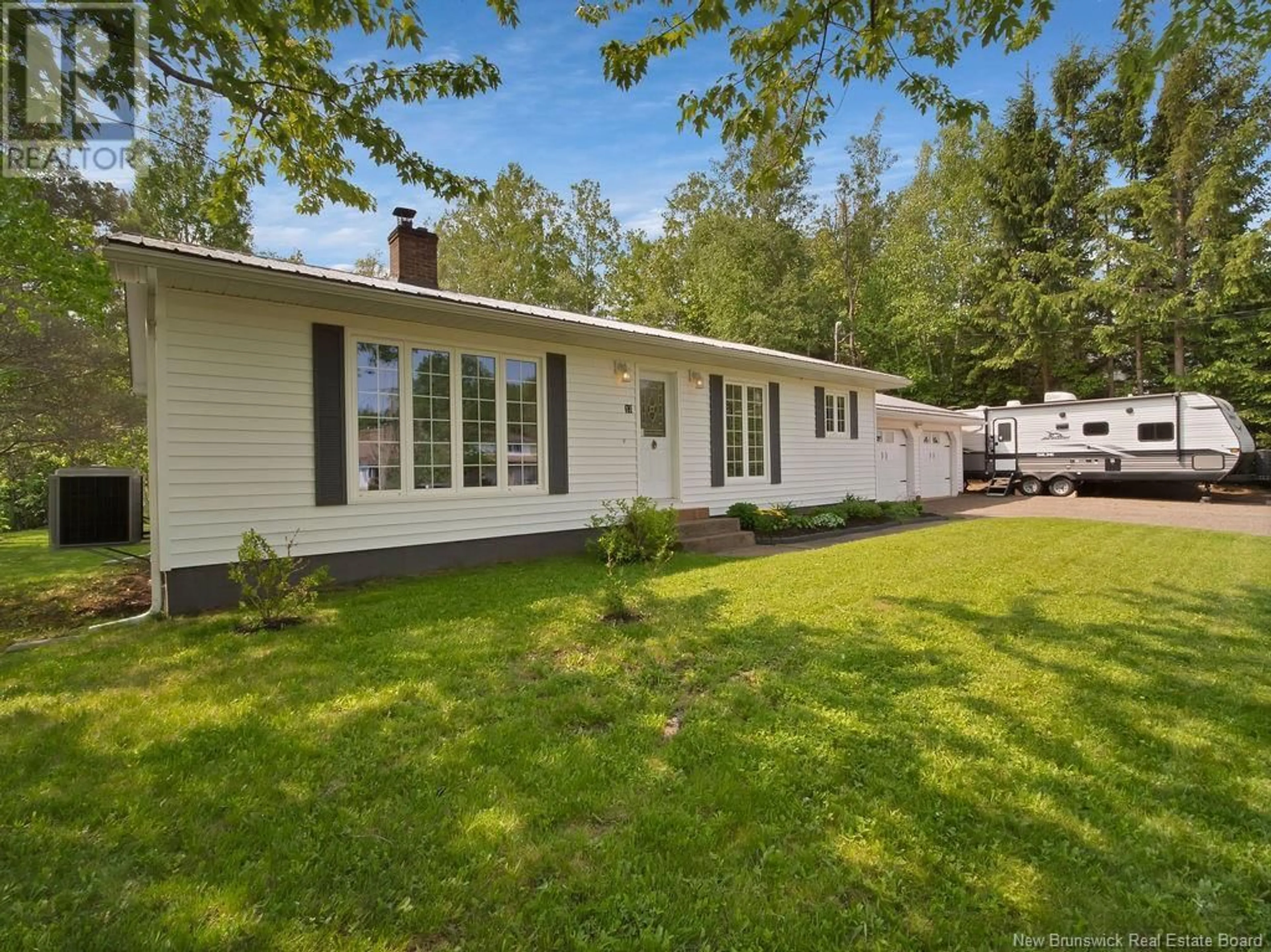 Home with vinyl exterior material, street for 13 LENWOOD STREET, Lower Coverdale New Brunswick E1J1L2