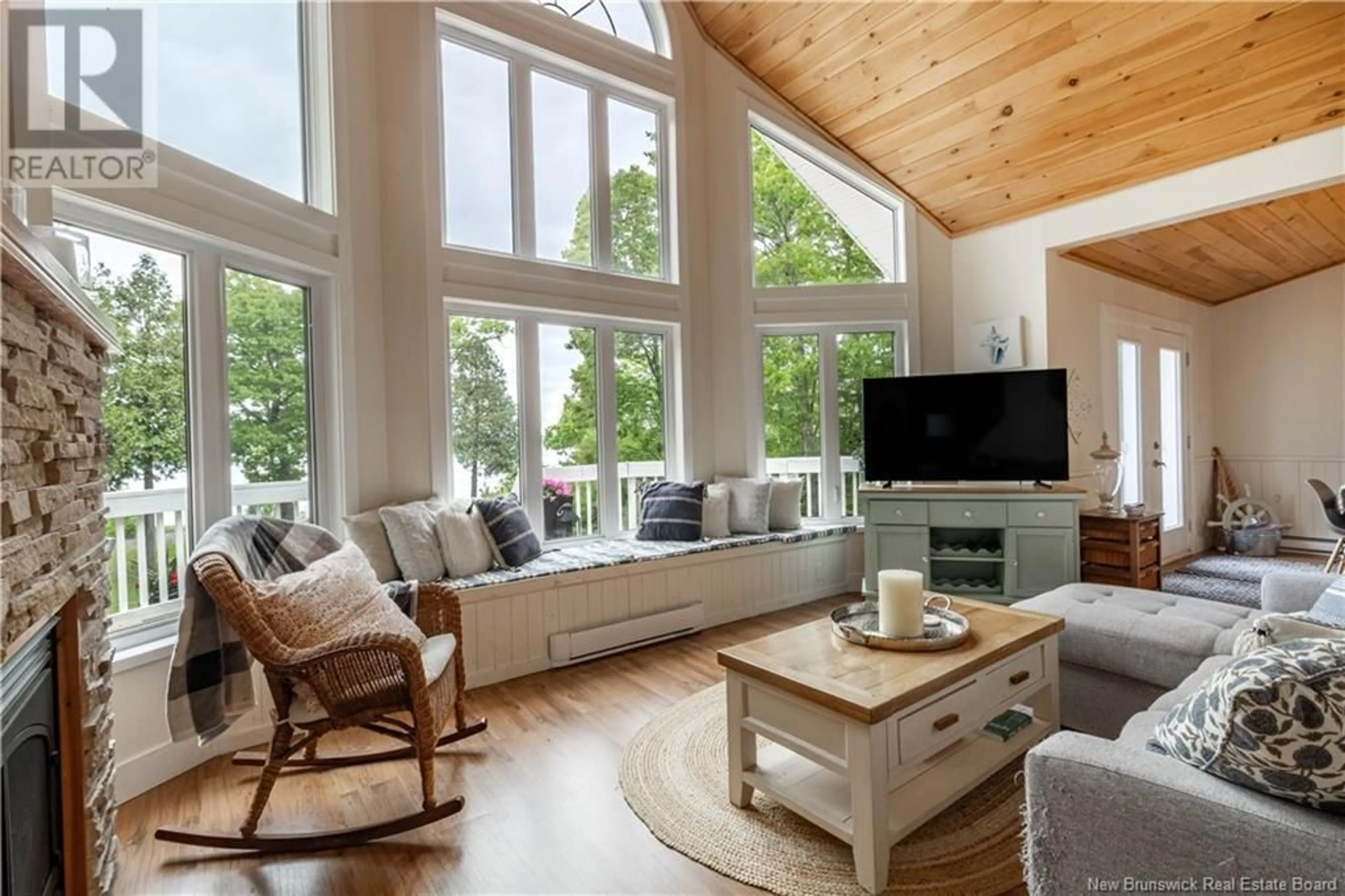 Living room with furniture, wood/laminate floor for 15 SCHOOL HOUSE LANE, Cumberland Bay New Brunswick E4A0A8