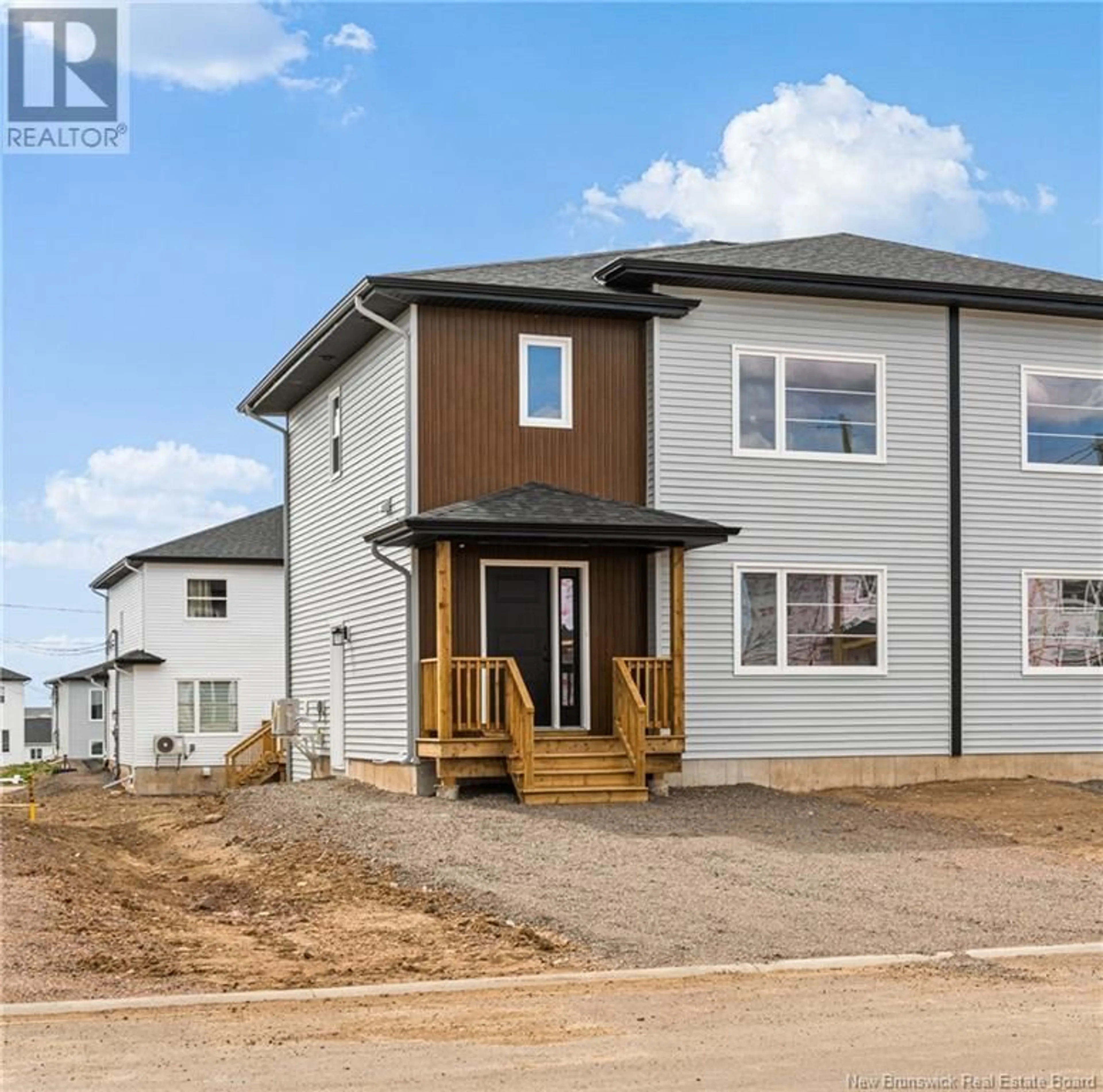 Home with vinyl exterior material, street for 207 TEABERRY AVENUE, Moncton New Brunswick E1G0E8