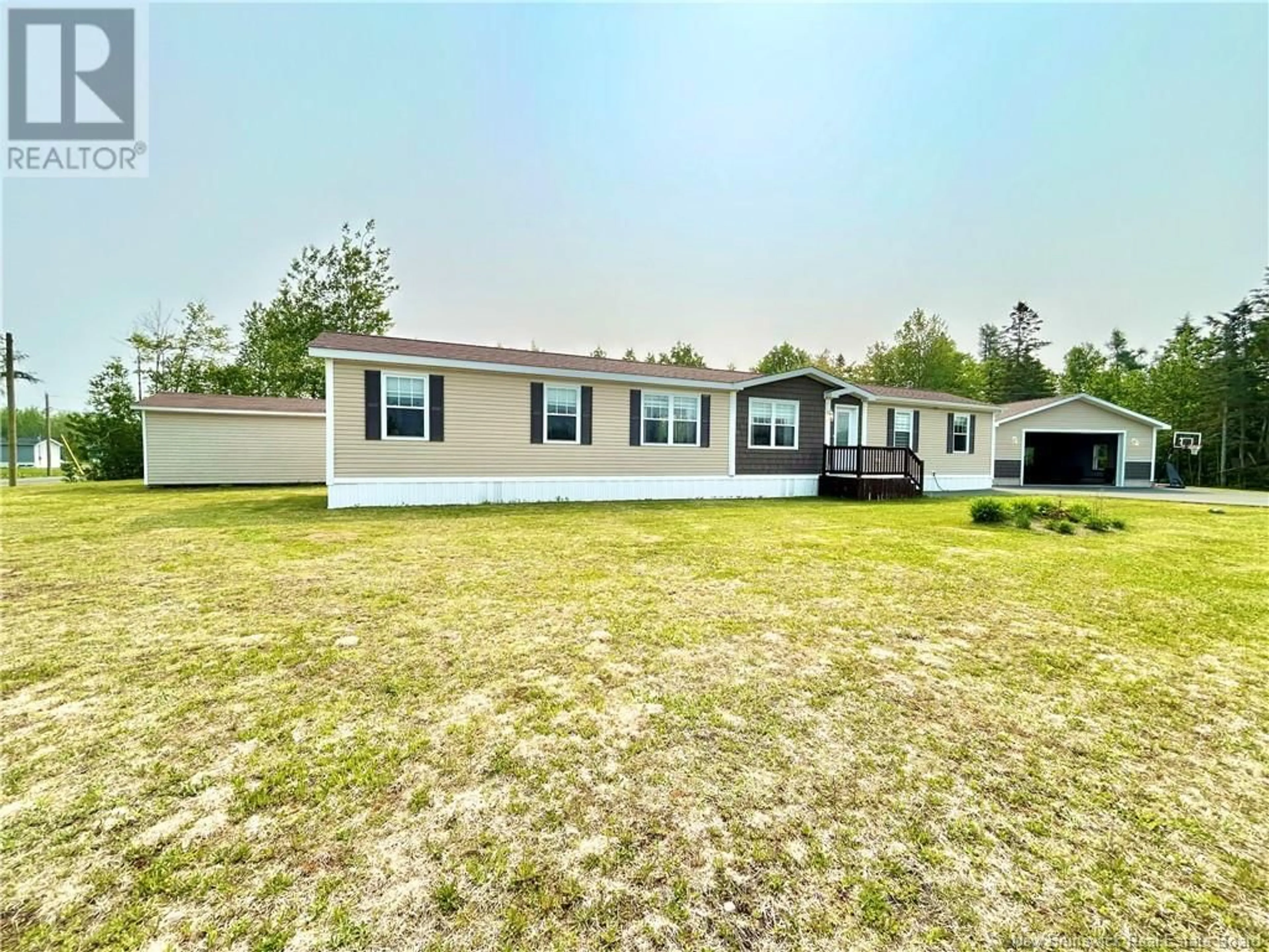 A pic from outside/outdoor area/front of a property/back of a property/a pic from drone, water/lake/river/ocean view for 6 DONAT STREET, Saint-Isidore New Brunswick E8M0A5