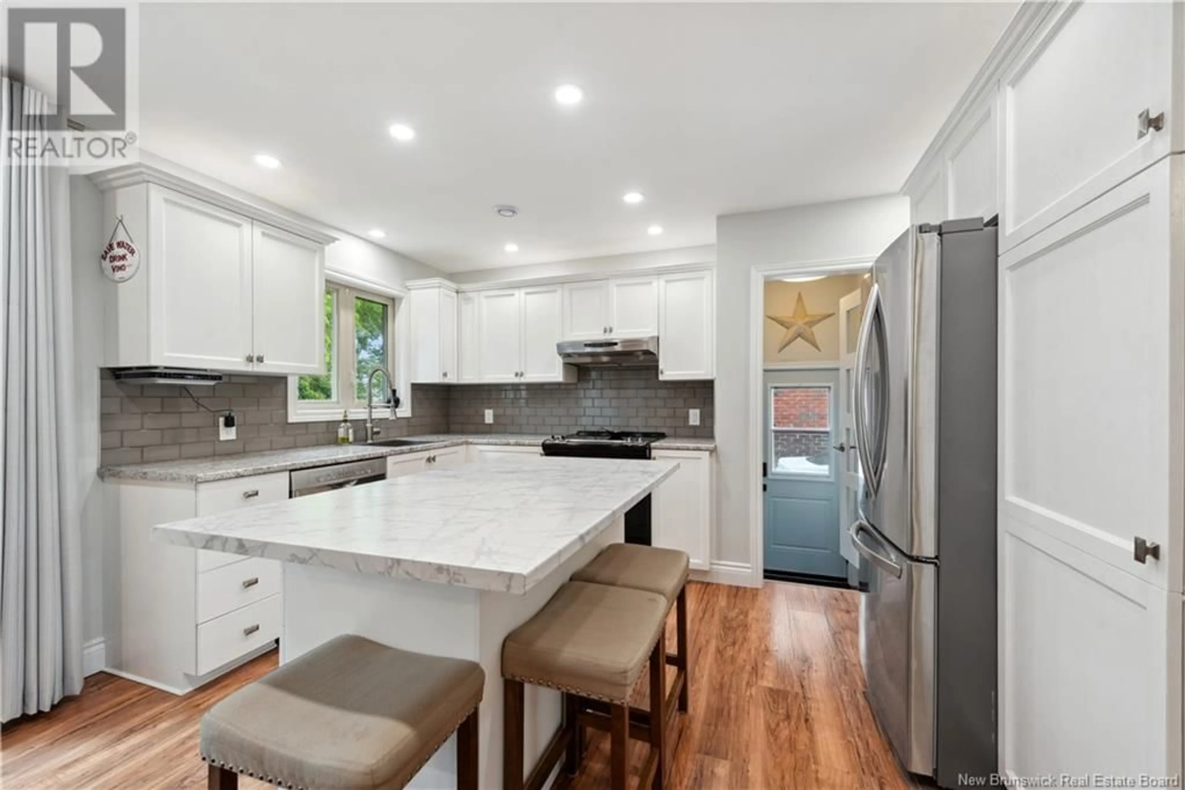 Open concept kitchen, ceramic/tile floor for 58 VINE AVENUE, Moncton New Brunswick E1E1J9