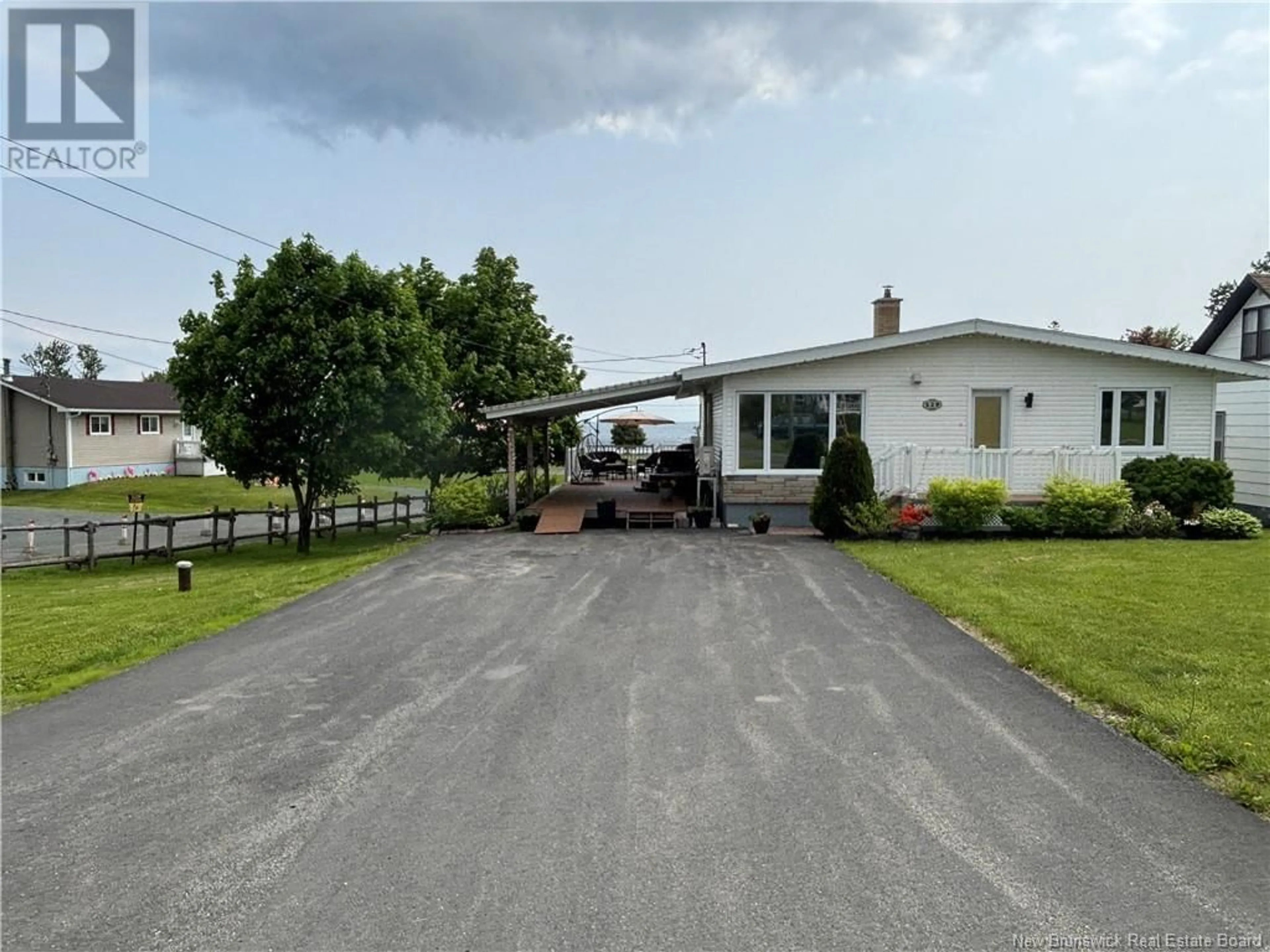 A pic from outside/outdoor area/front of a property/back of a property/a pic from drone, street for 529 RUE PRINCIPALE, Pointe-Verte New Brunswick E8J3A2