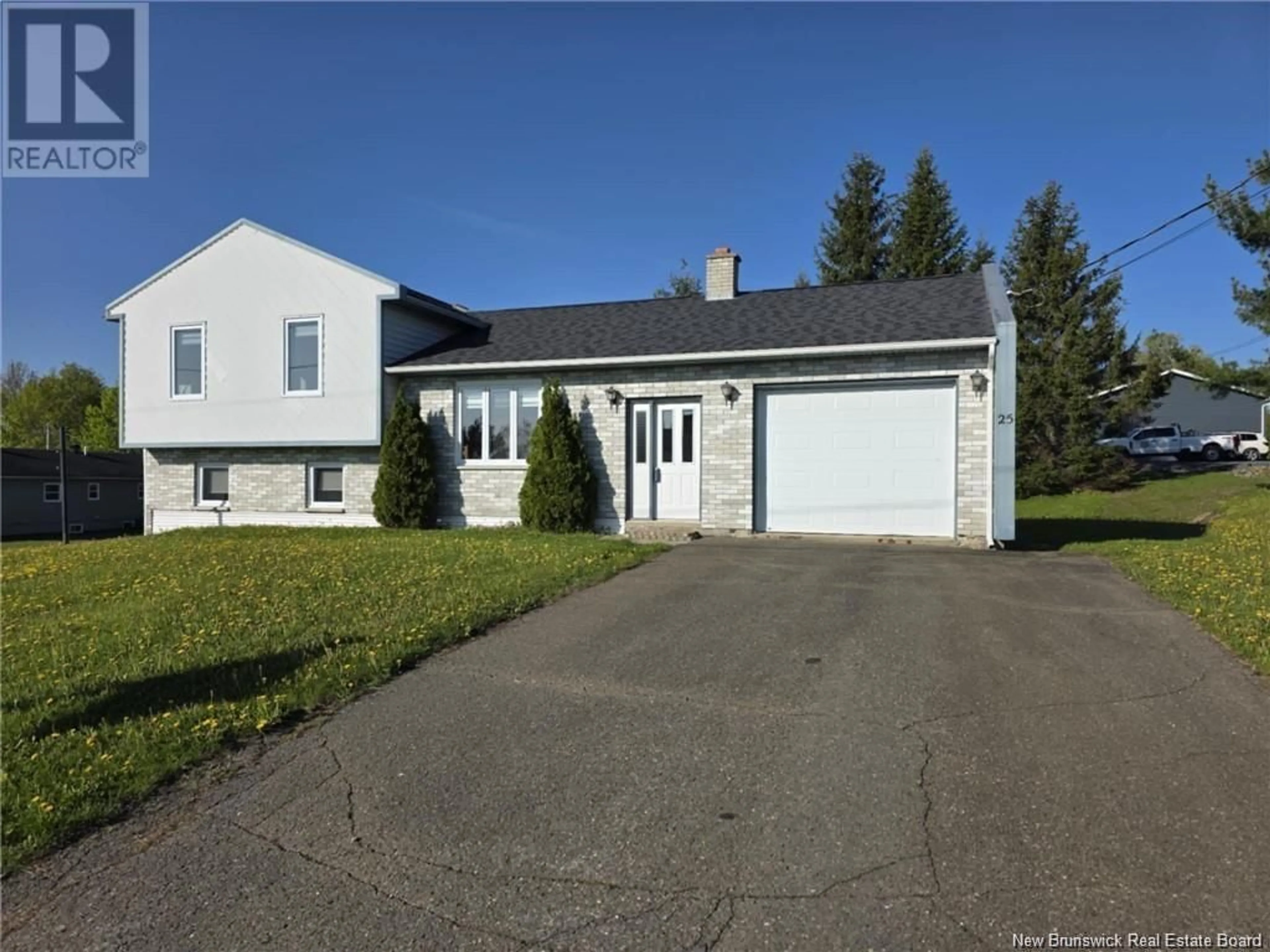 Home with vinyl exterior material, street for 25 MARCEL STREET, Grand-Sault/Grand Falls New Brunswick E3Y1B7