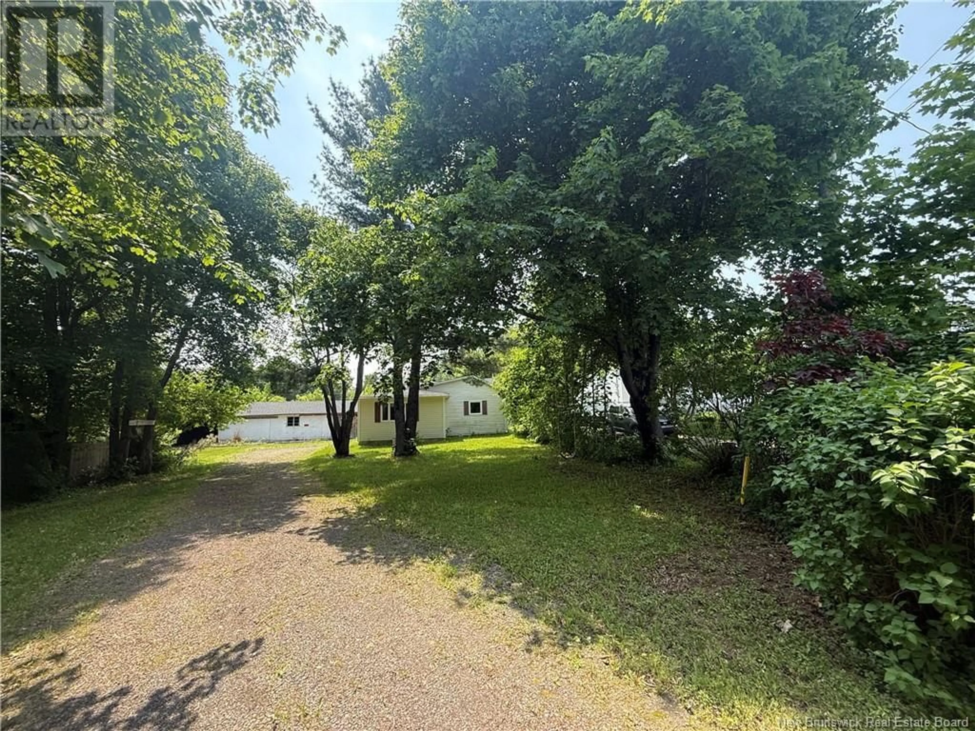 A pic from outside/outdoor area/front of a property/back of a property/a pic from drone, forest/trees view for 2 BERTHA, Bouctouche New Brunswick E4S2W6