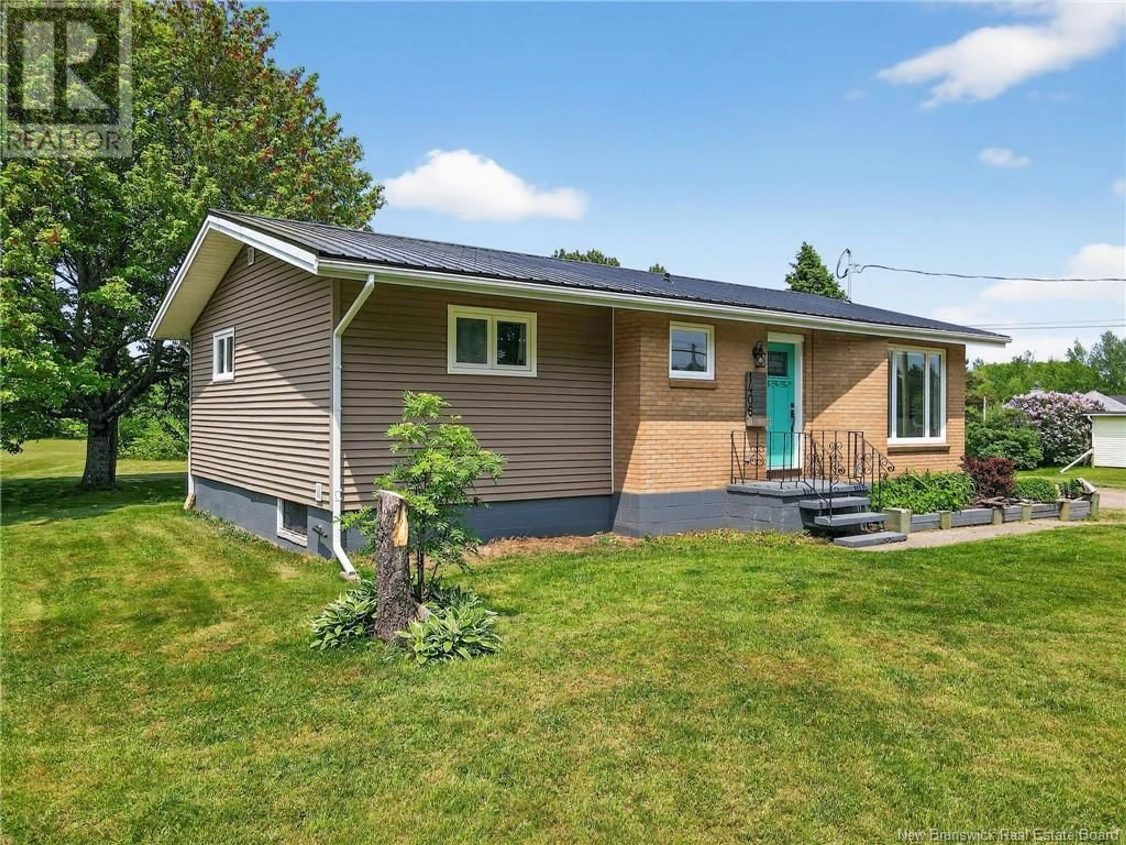 Home with vinyl exterior material, street for 1406 RTE 133, Grand-Barachois New Brunswick E4P8G7