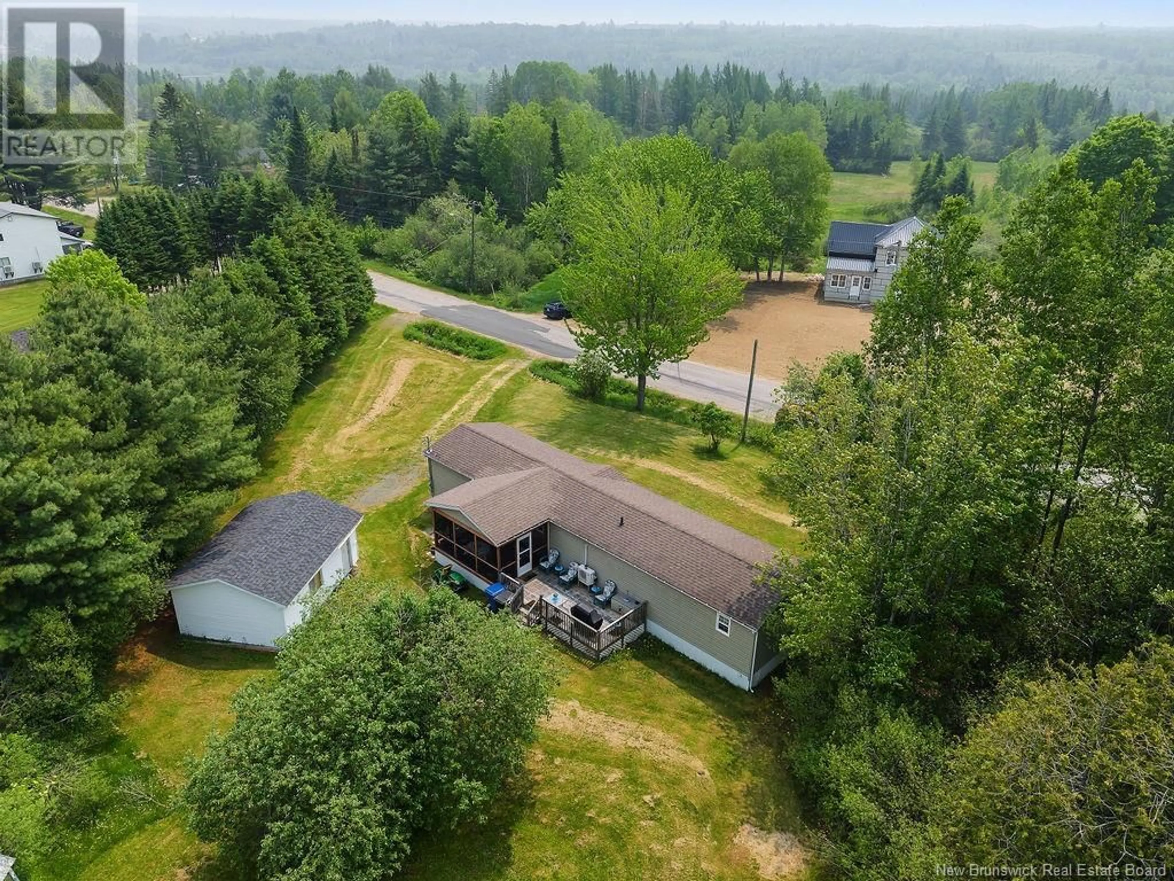 A pic from outside/outdoor area/front of a property/back of a property/a pic from drone, unknown for 88 MCLAGGAN DRIVE, Blackville New Brunswick E9B1C6