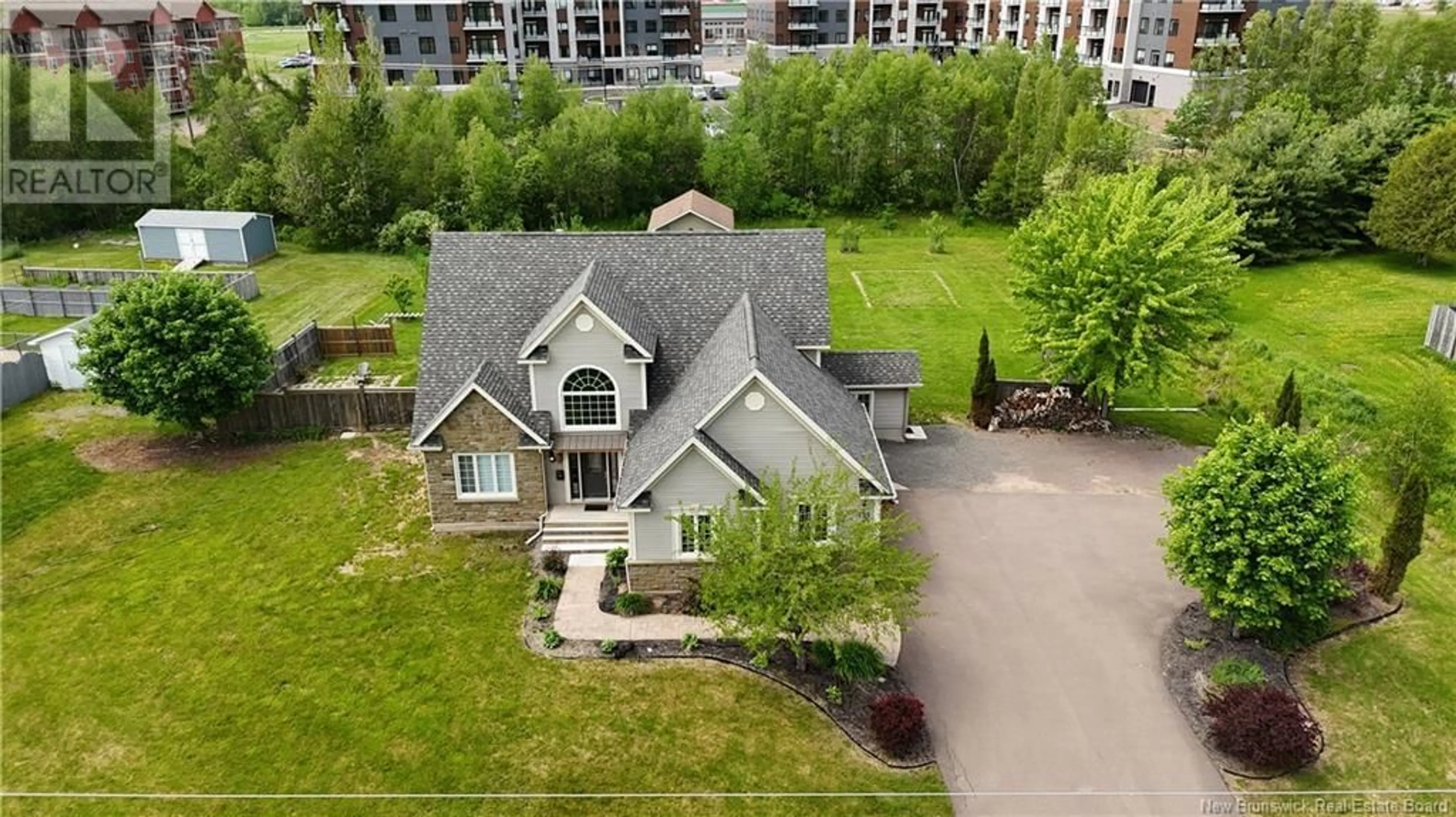 A pic from outside/outdoor area/front of a property/back of a property/a pic from drone, unknown for 733 CHARTERSVILLE ROAD, Dieppe New Brunswick E1A1K7
