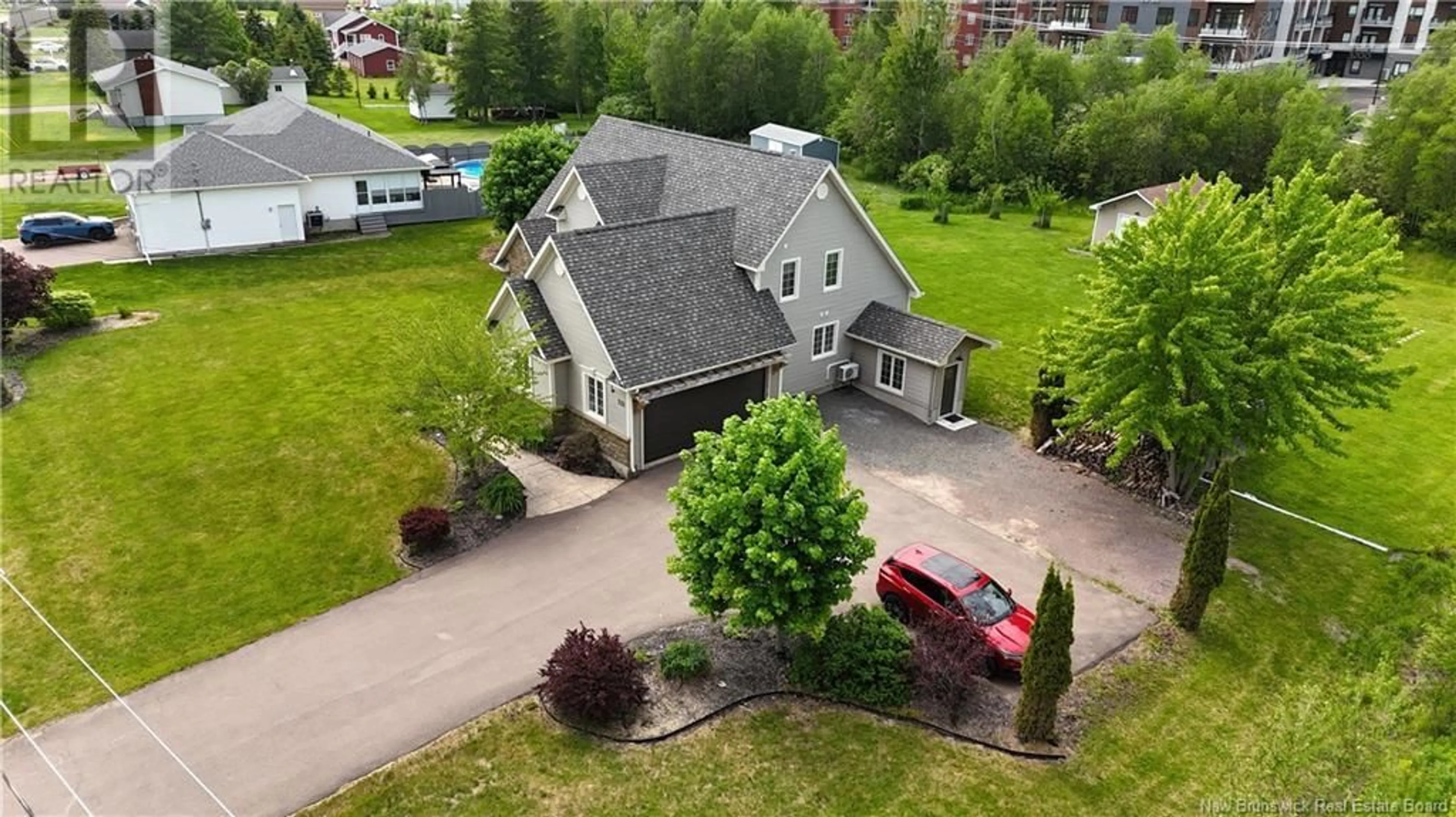 A pic from outside/outdoor area/front of a property/back of a property/a pic from drone, street for 733 CHARTERSVILLE ROAD, Dieppe New Brunswick E1A1K7