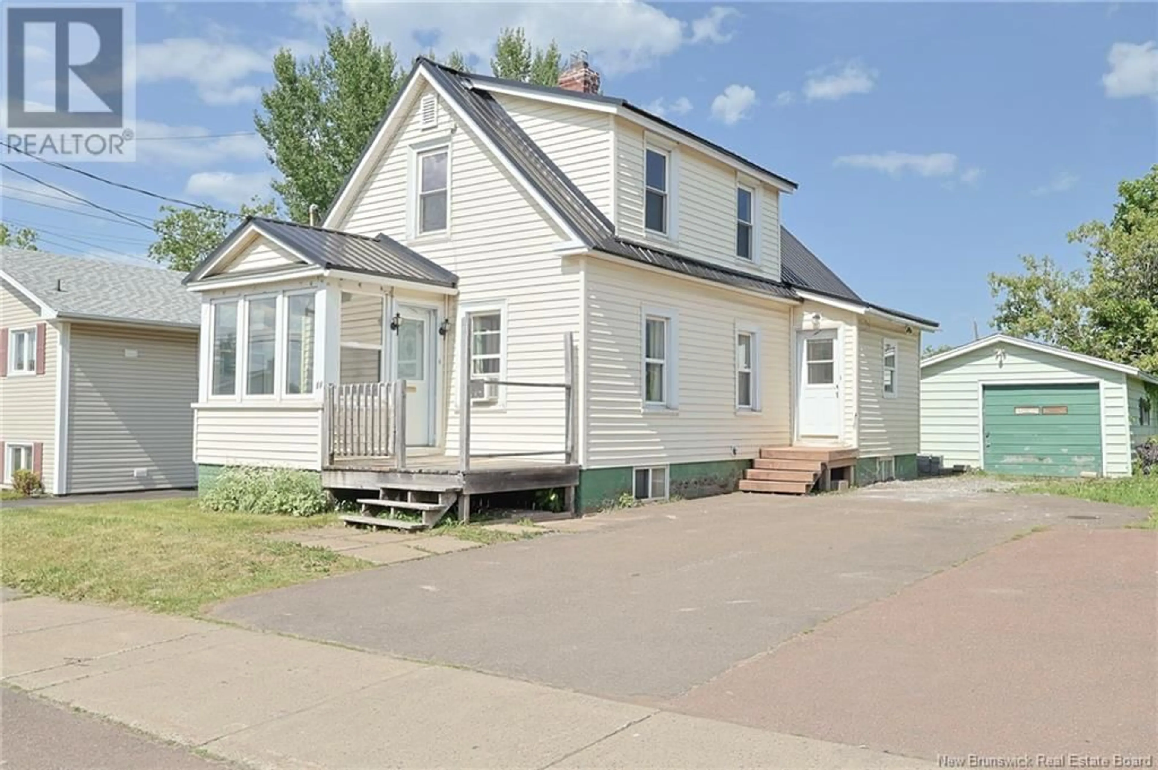 Home with vinyl exterior material, street for 69 CEDAR, Moncton New Brunswick E1C7L3