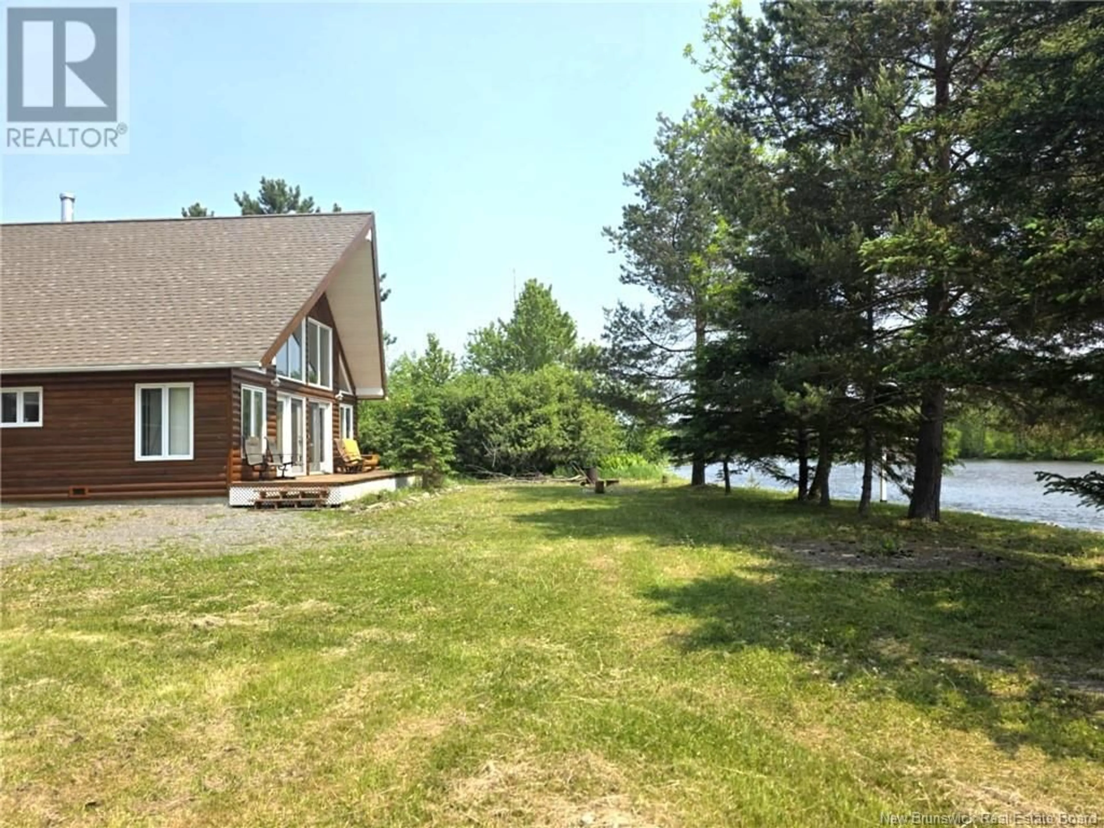 A pic from outside/outdoor area/front of a property/back of a property/a pic from drone, water/lake/river/ocean view for 51 POITRAS LANE, Riley Brook New Brunswick E7G3B9