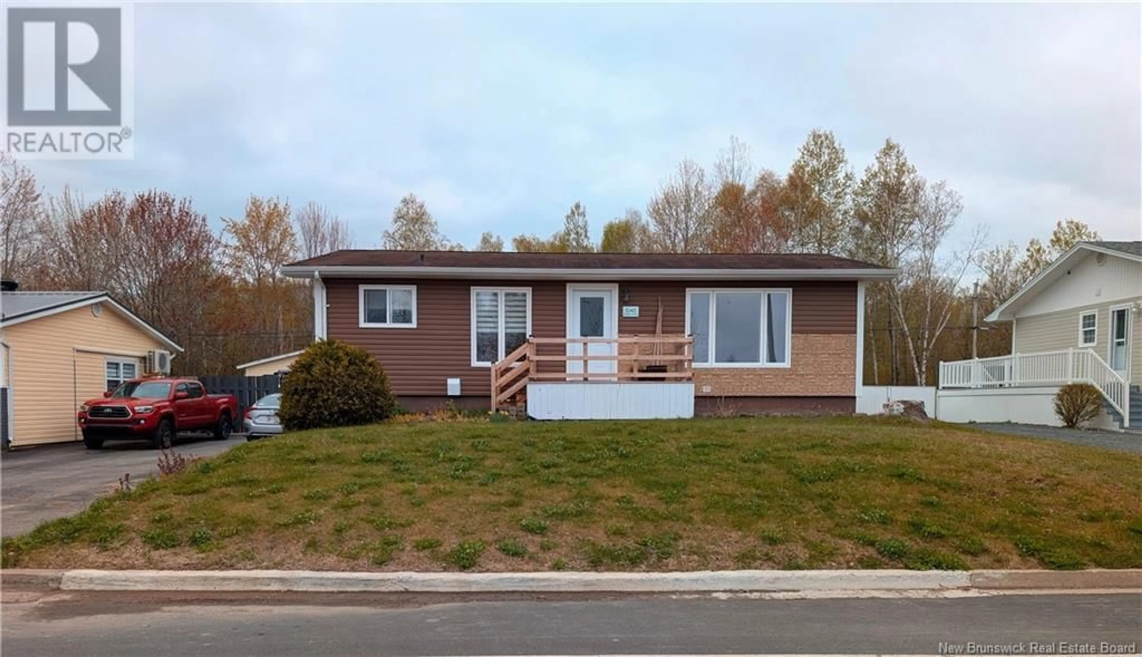 Home with vinyl exterior material, street for 1045 VICTORIA AVENUE, Bathurst New Brunswick E2A3K1