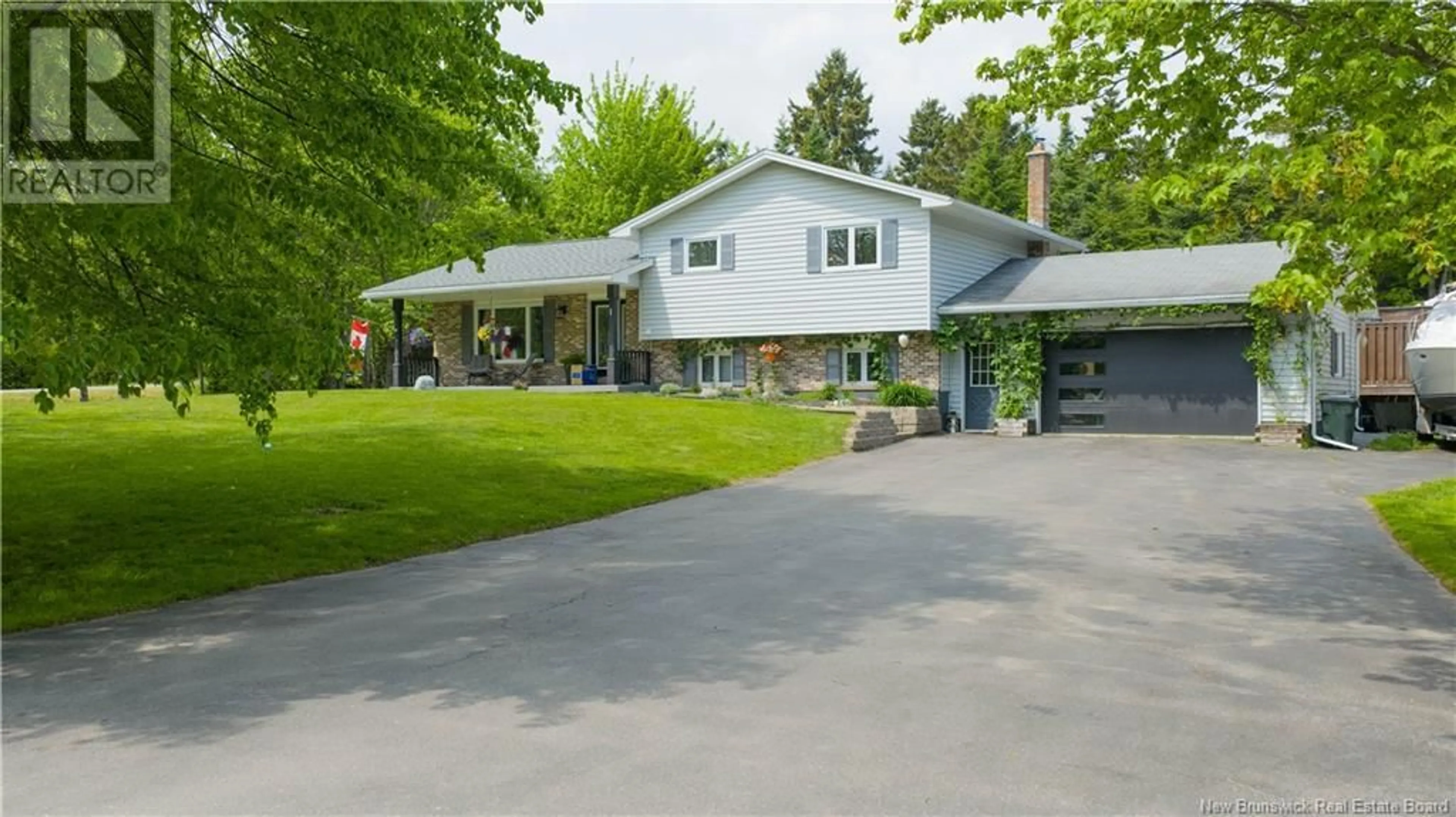 Home with vinyl exterior material, street for 1 BRIDGETE LANE, Rothesay New Brunswick E2S1A7
