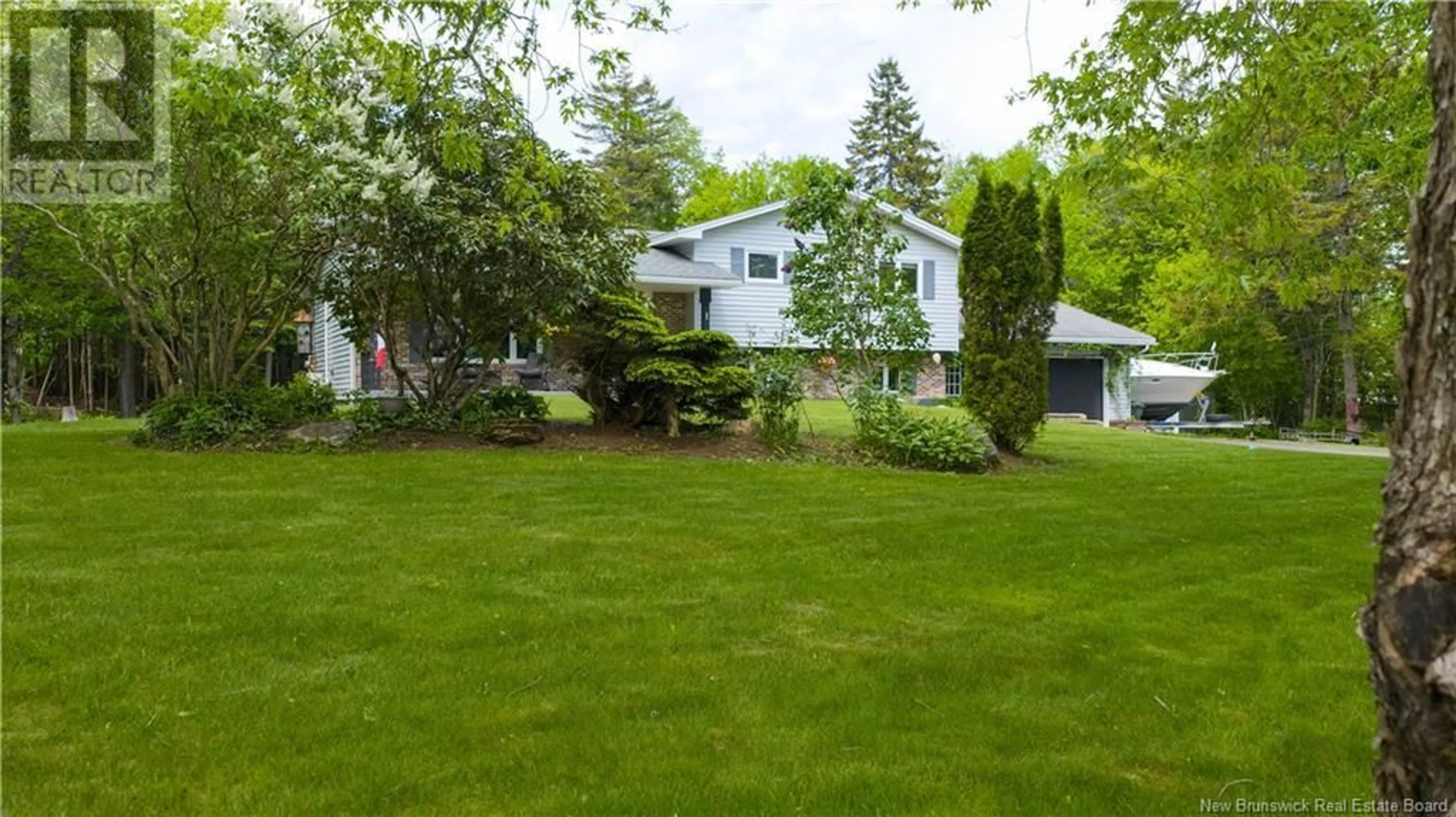 A pic from outside/outdoor area/front of a property/back of a property/a pic from drone, street for 1 BRIDGETE LANE, Rothesay New Brunswick E2S1A7