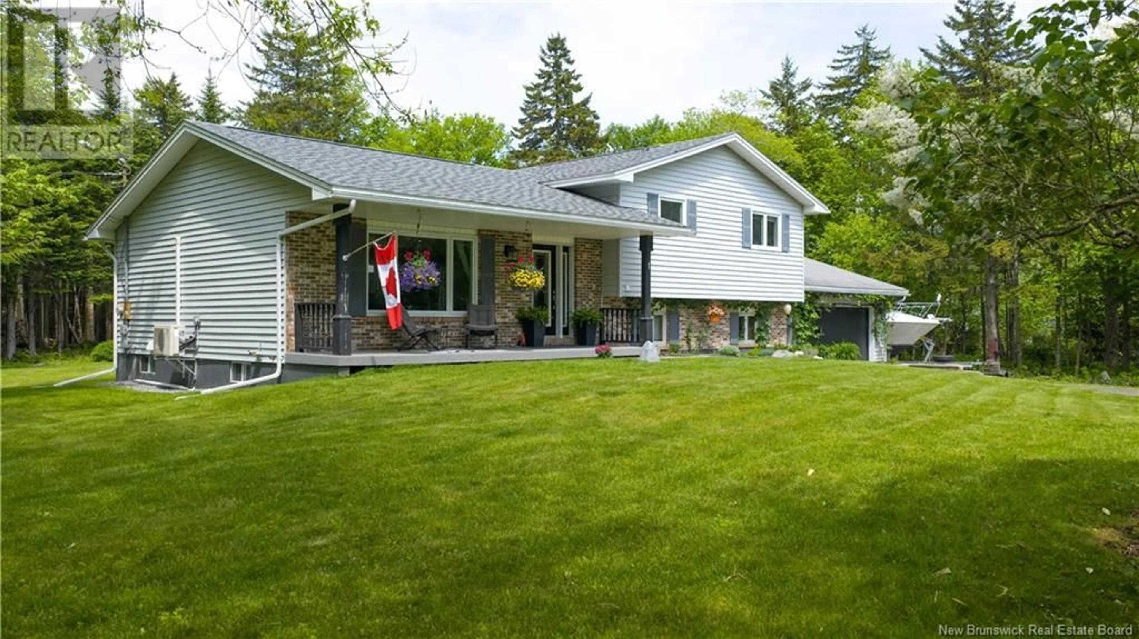 Home with vinyl exterior material, street for 1 BRIDGETE LANE, Rothesay New Brunswick E2S1A7