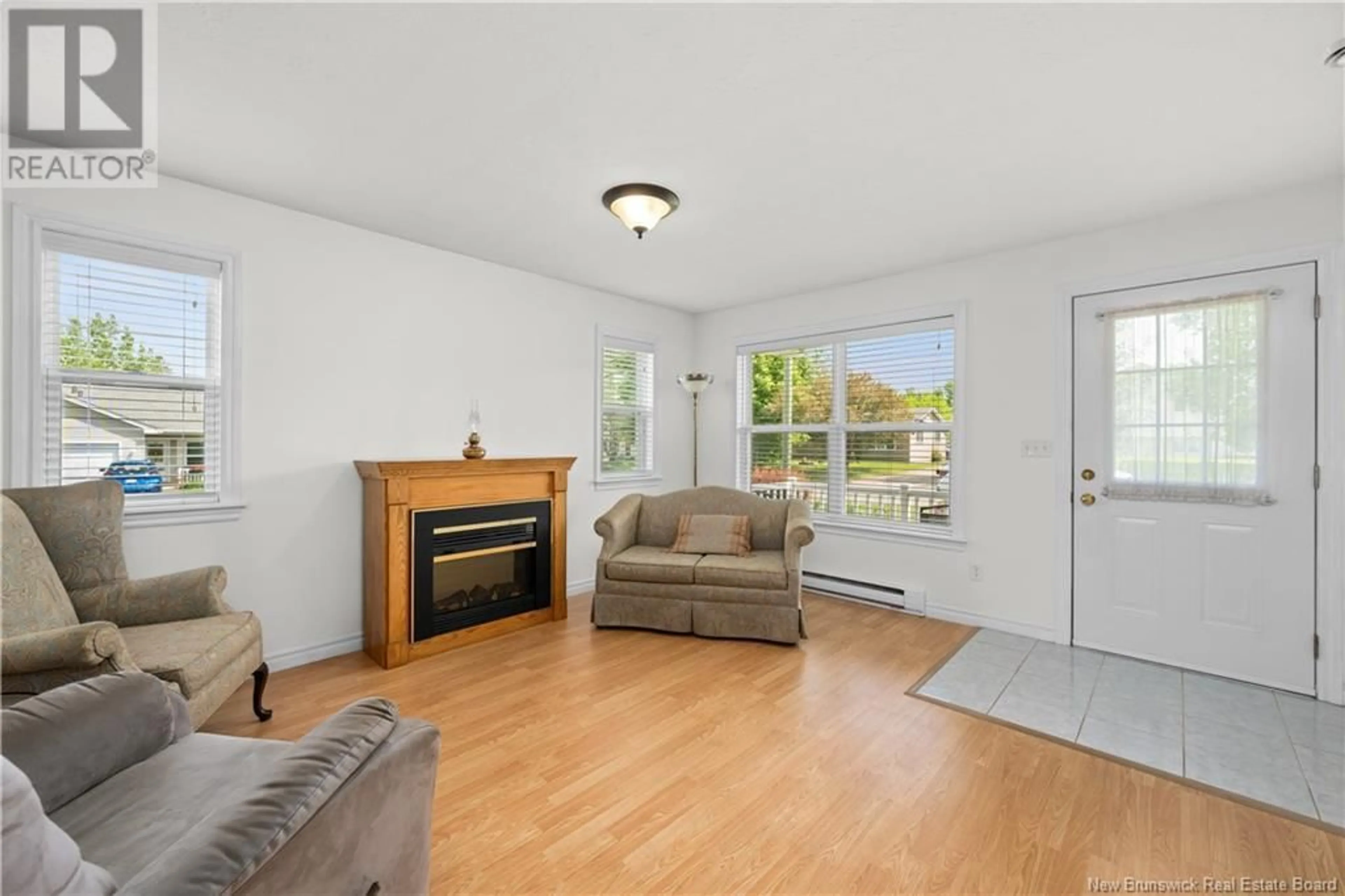 Living room with furniture, wood/laminate floor for 24 TOWNSEND AVENUE, Riverview New Brunswick E1B5T6