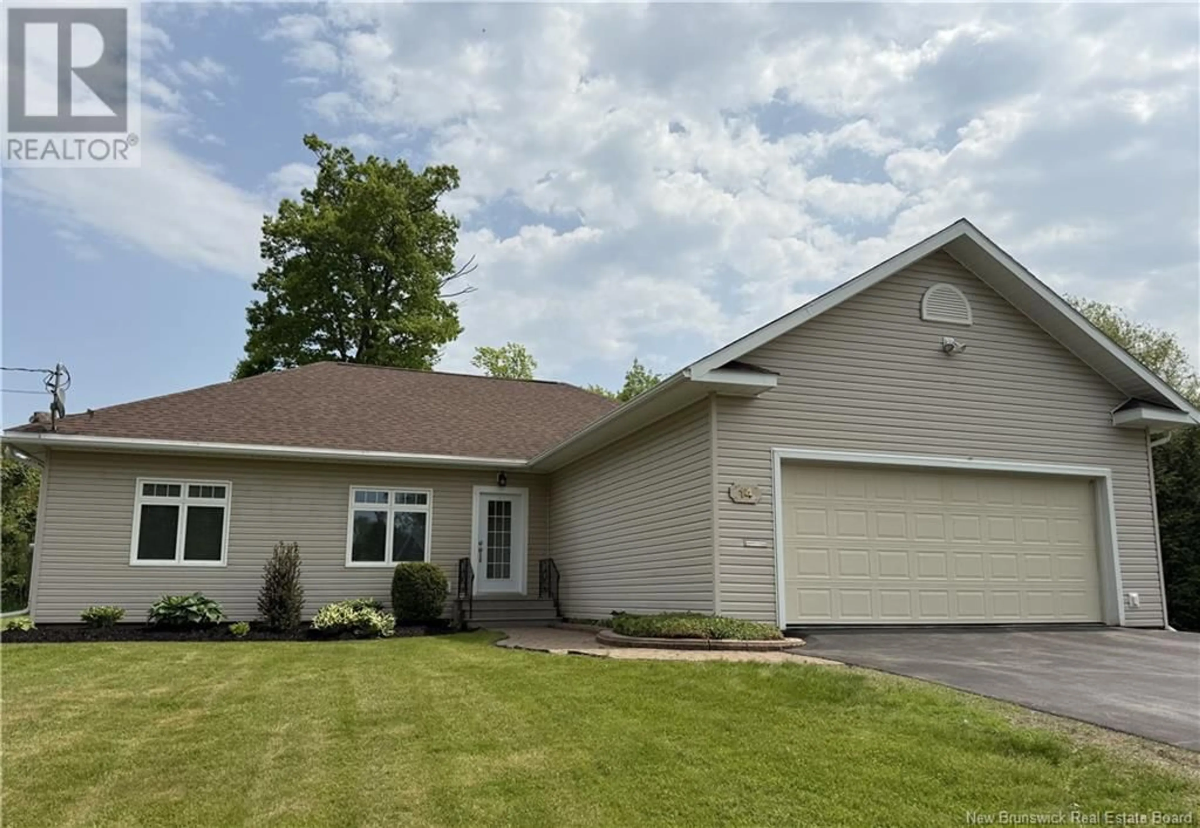 Home with vinyl exterior material, street for 14 HARTFORD LANE, St. Stephen New Brunswick E3L3A7