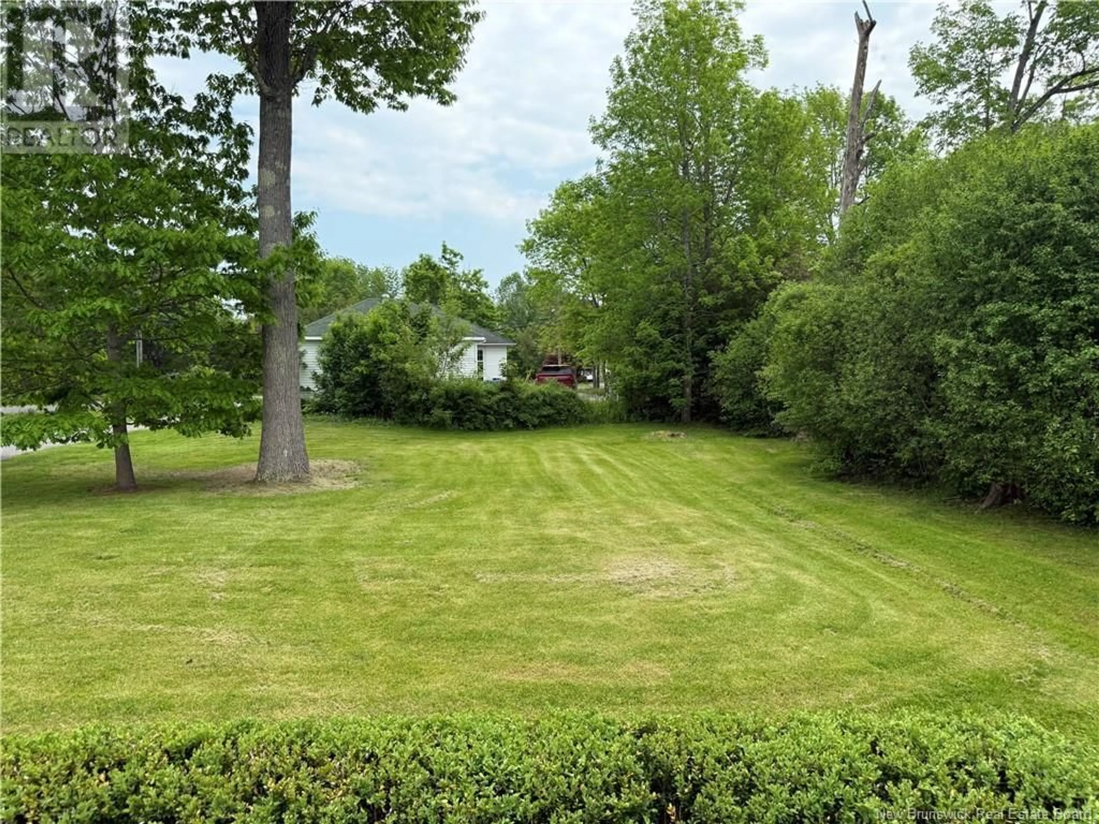A pic from outside/outdoor area/front of a property/back of a property/a pic from drone, forest/trees view for 14 HARTFORD LANE, St. Stephen New Brunswick E3L3A7