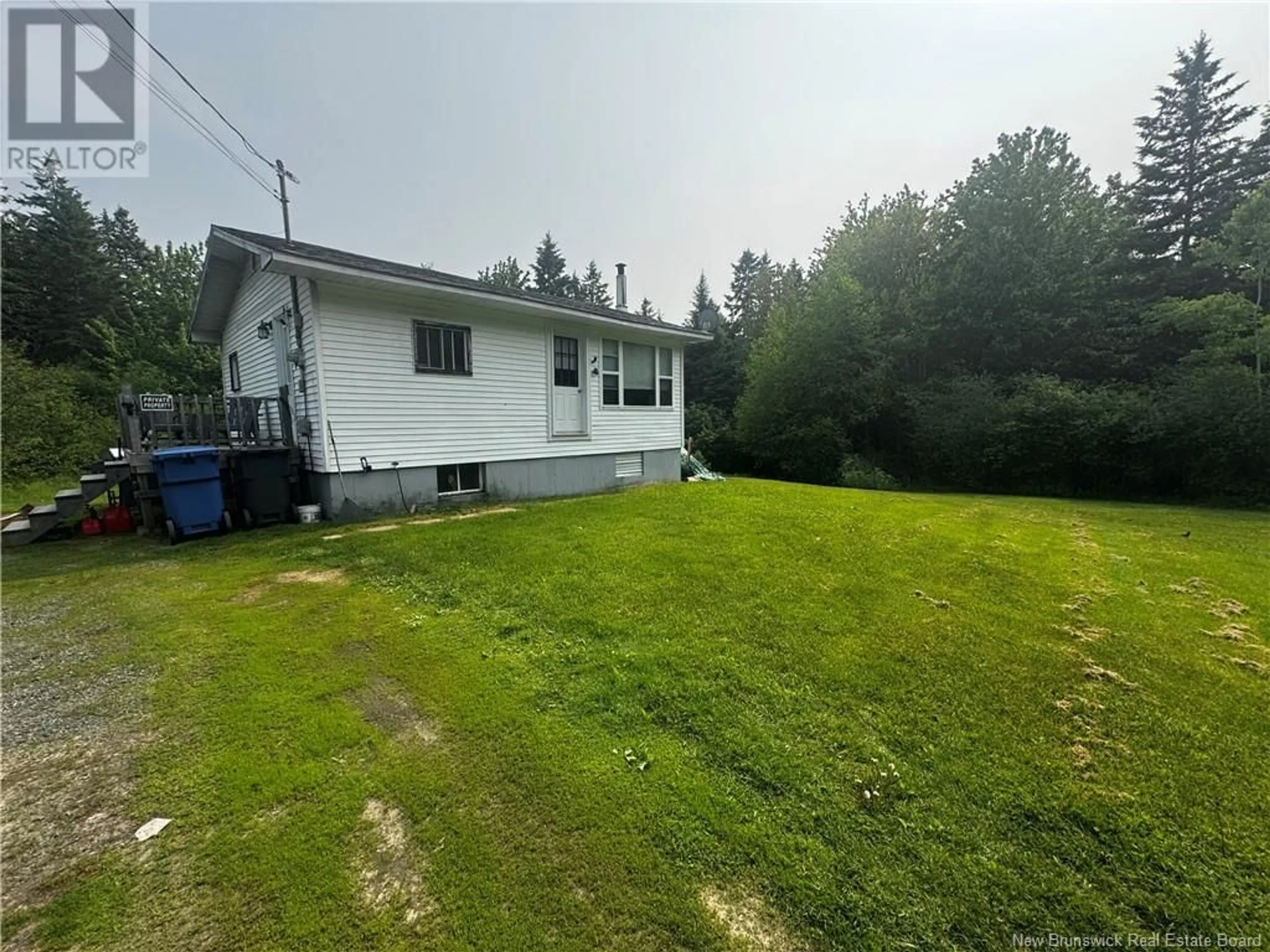 A pic from outside/outdoor area/front of a property/back of a property/a pic from drone, unknown for 3 BEVIN LANE, White Rapids New Brunswick E9B1B7