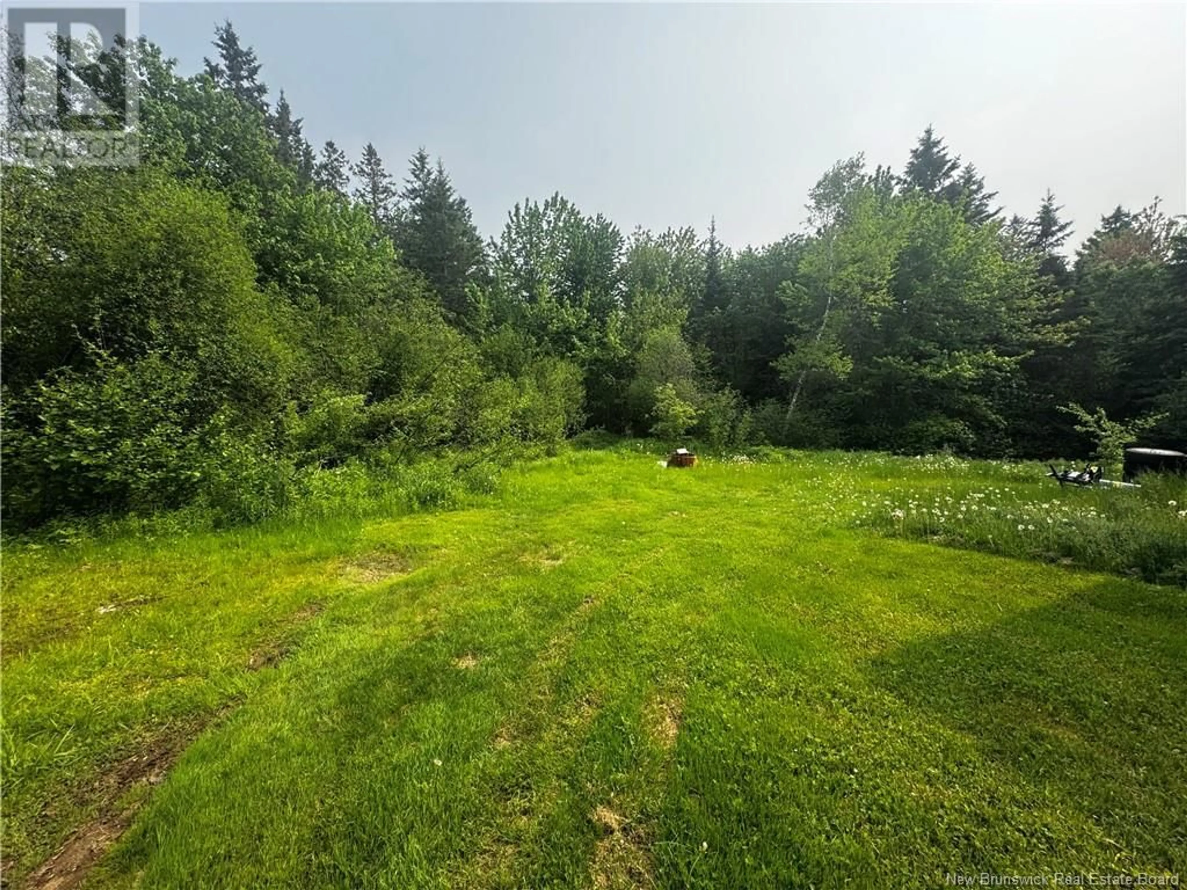 A pic from outside/outdoor area/front of a property/back of a property/a pic from drone, forest/trees view for 3 BEVIN LANE, White Rapids New Brunswick E9B1B7