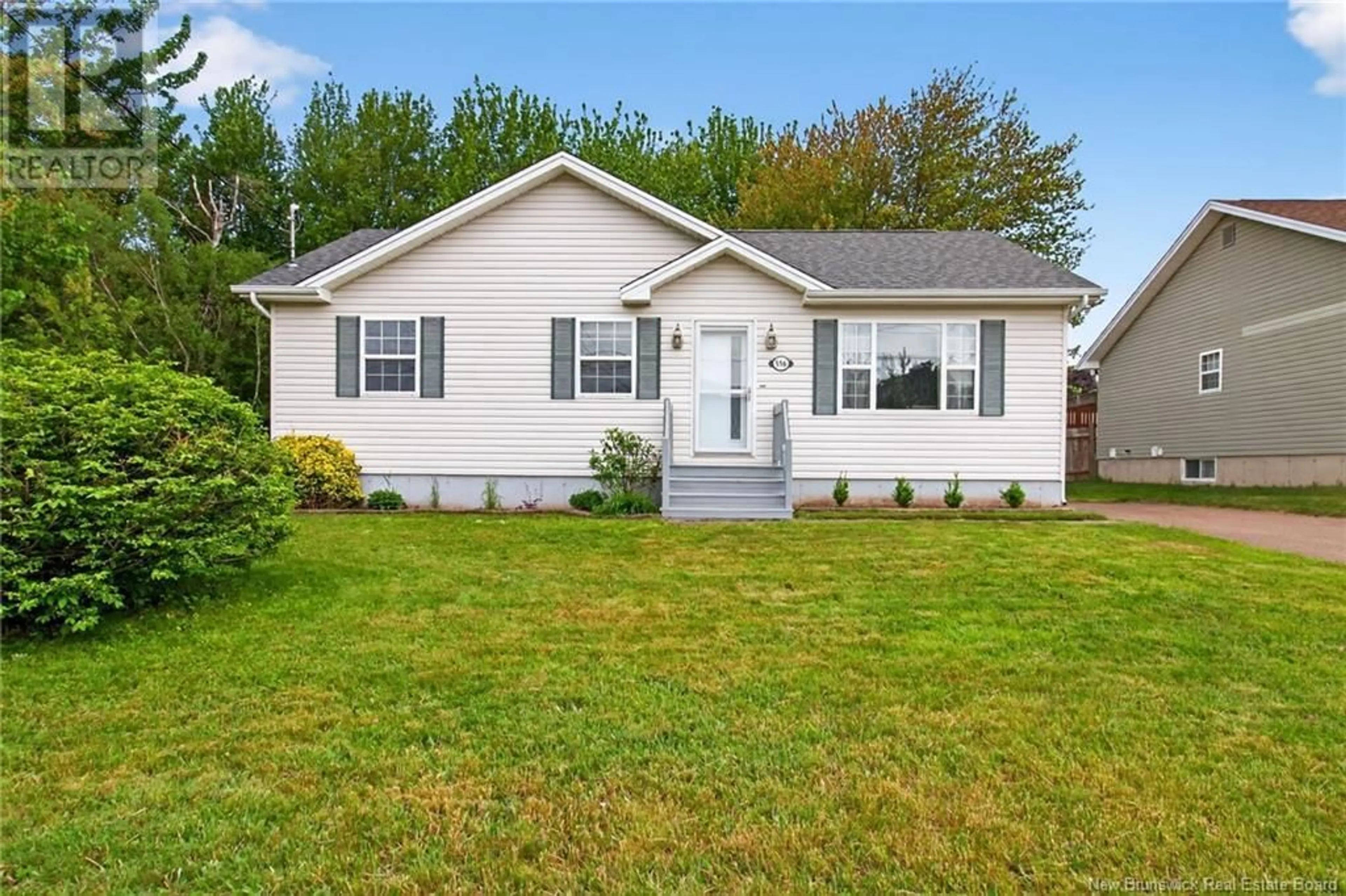 Home with vinyl exterior material, street for 556 LOUIS STREET, Dieppe New Brunswick E1A6Y9