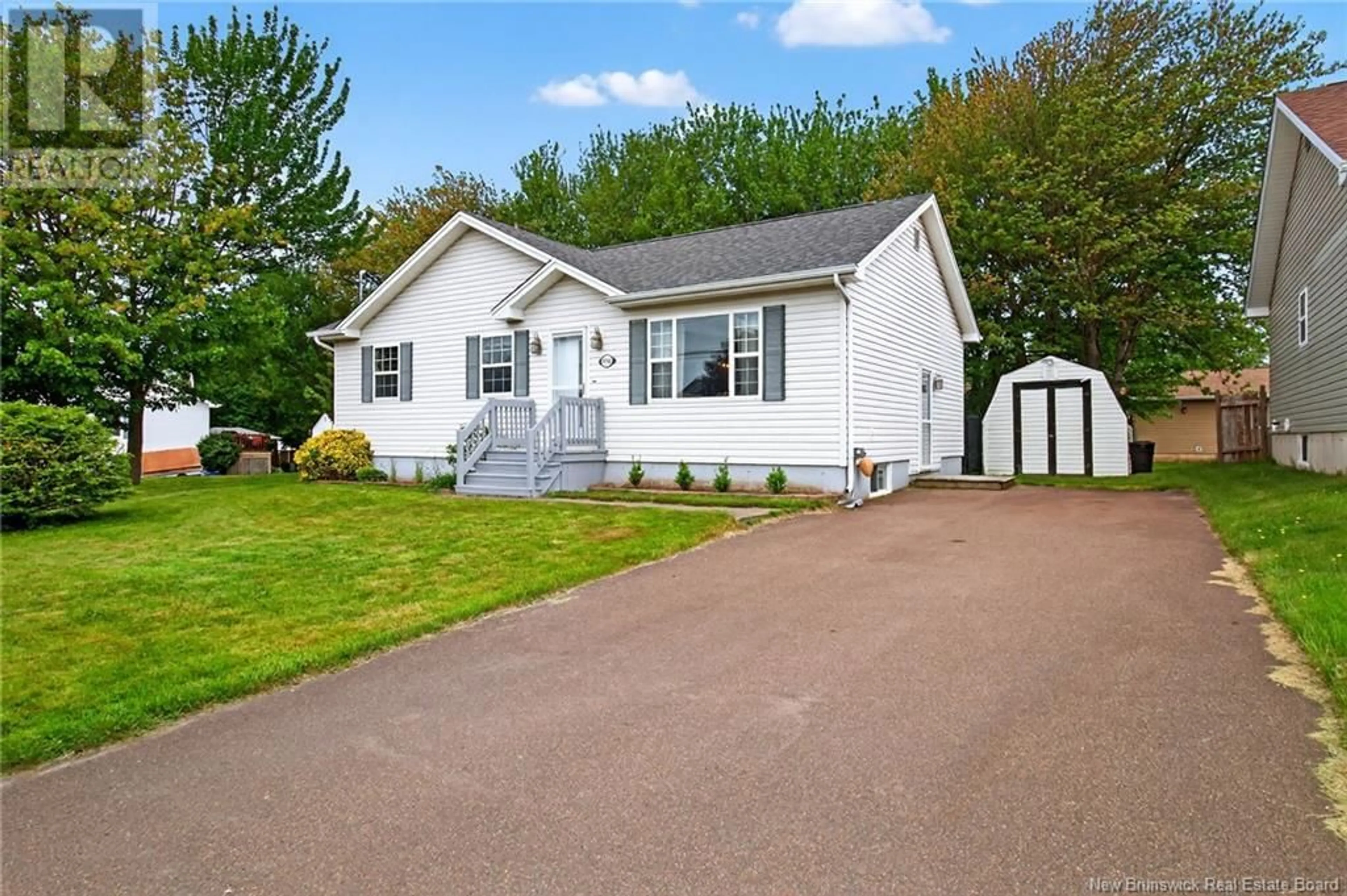 Home with vinyl exterior material, street for 556 LOUIS STREET, Dieppe New Brunswick E1A6Y9