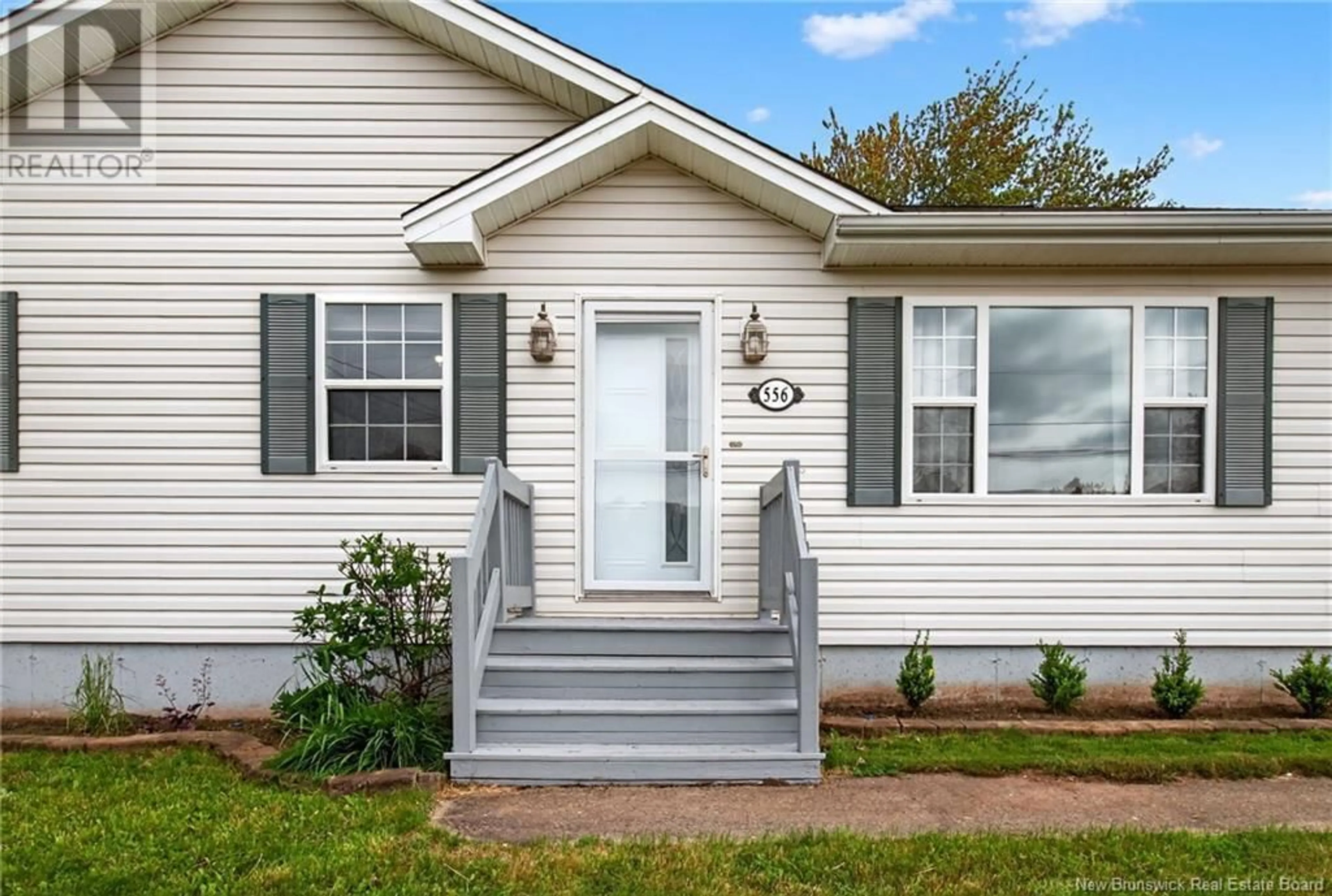 Home with vinyl exterior material, street for 556 LOUIS STREET, Dieppe New Brunswick E1A6Y9